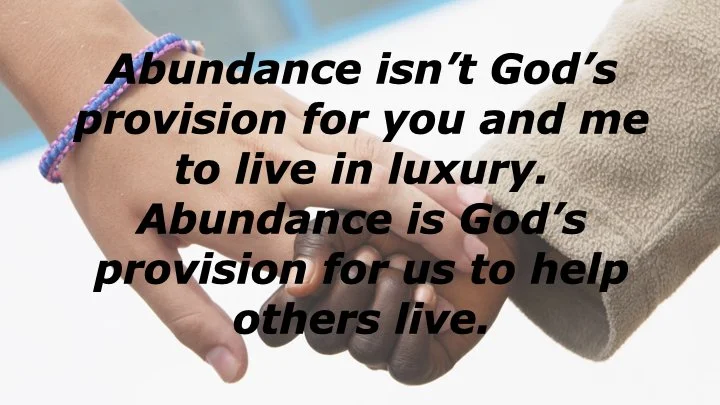 Two people holding hands, one wearing a colorful bracelet and the other in a beige sleeve, with an overlay of inspirational text about abundance and helping others.