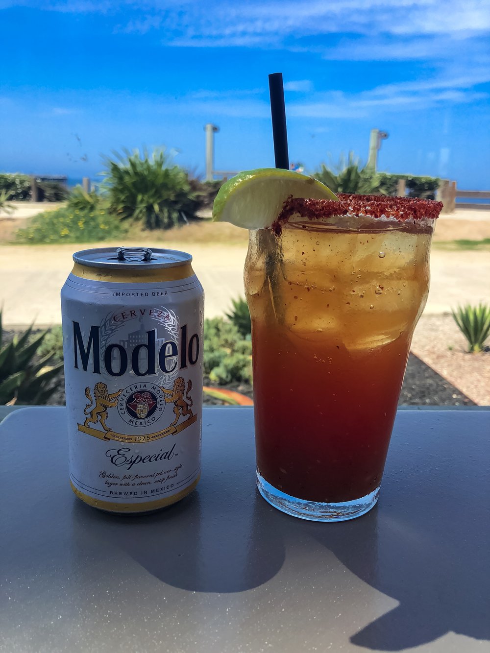  a michelada by the beach using modelo beer 