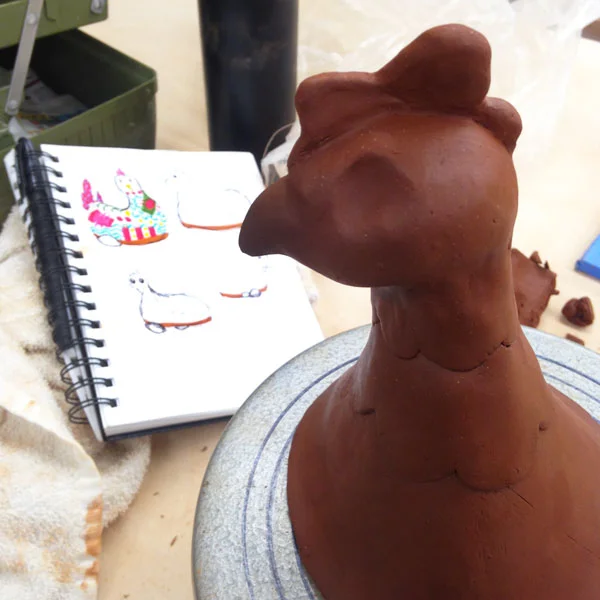 A few sketches along with the first chicken sculpture. 