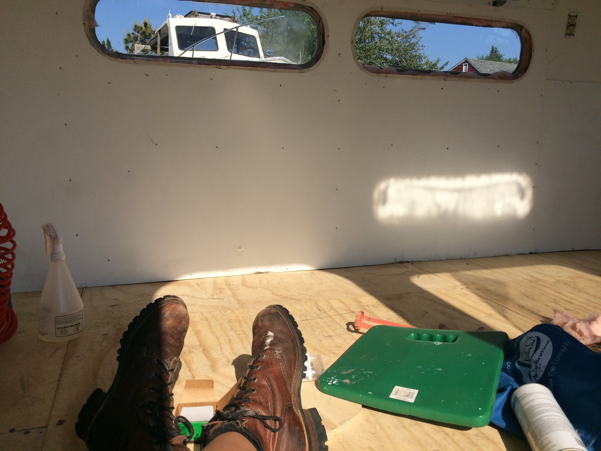  Taking a break on Cilla's new plywood floor.&nbsp; 