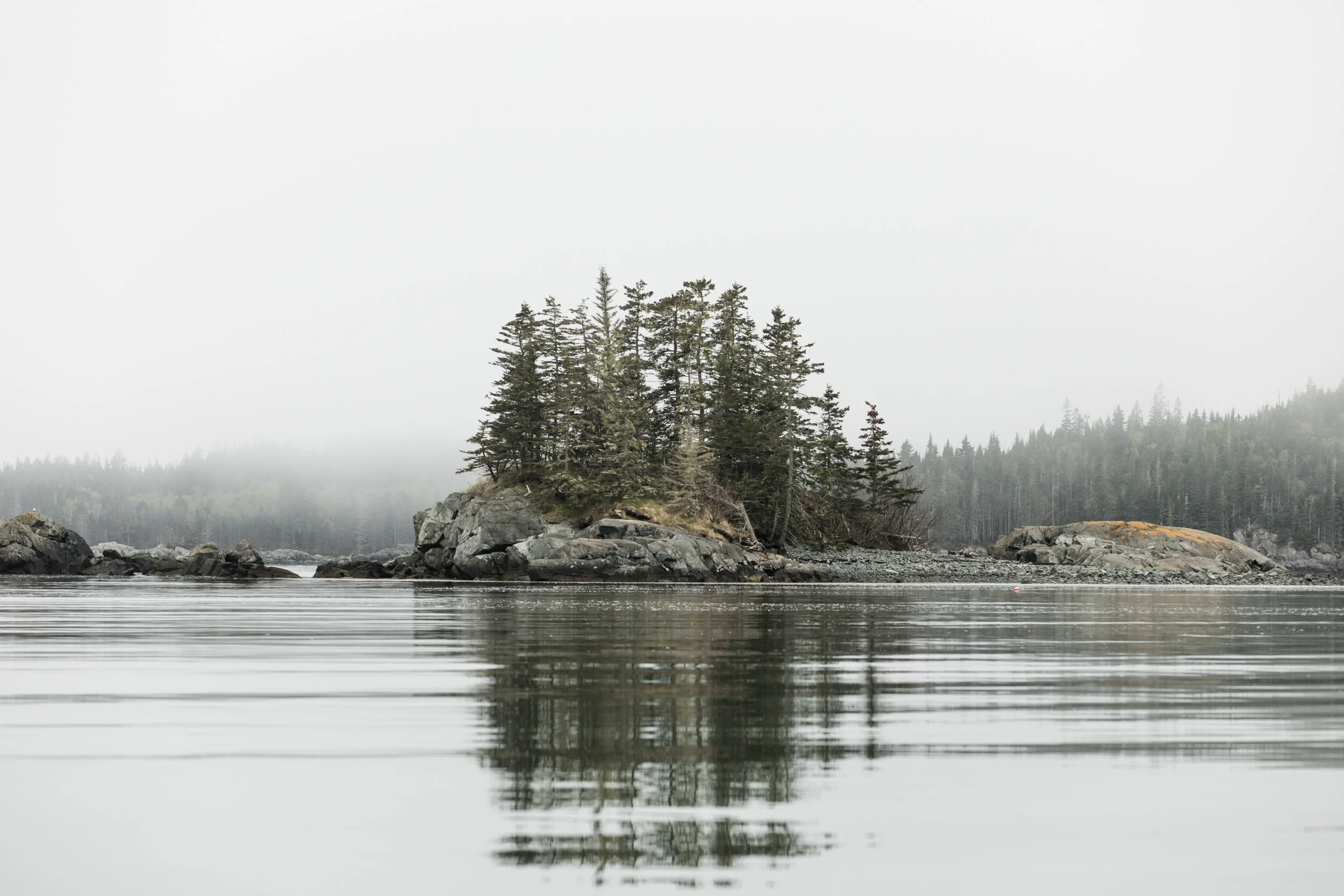 “When I was younger, I grew up in North Lubec, you knew everybody. Christ! We used to have, I don't know how many, kids up there having fun and everything. I used to mow lawns, my father owned a blueberry land up the road here, we used to rake blueberries for our clothes for school. We just didn't get free money, we all worked and raked berries and all that. I worked in the hen house, I worked clamming, with my father. My father dug clams in the beginning and also kept wood, so you learned all this stuff growing up and you knew everybody.” George “Bubba” Eaton, Lubec