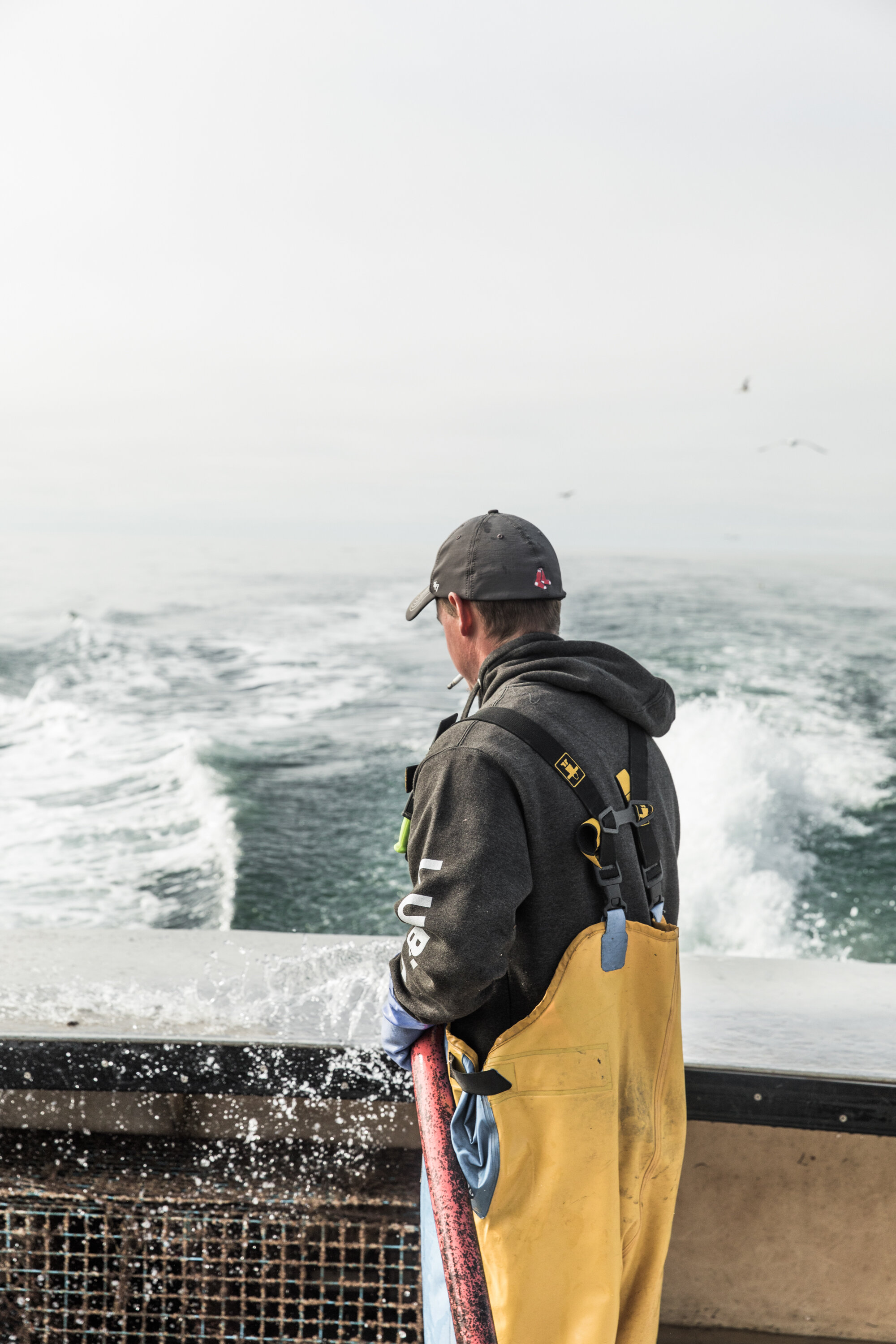   Jake (last name) halibut fishing     “We gotta go catch the slack. Hauling halibut you have to haul it on a slack so there isn't so much tide fightin' the fish. It’s hard bottom in here, that’s why I fish it. It’s a weird fishery, trying to figure 