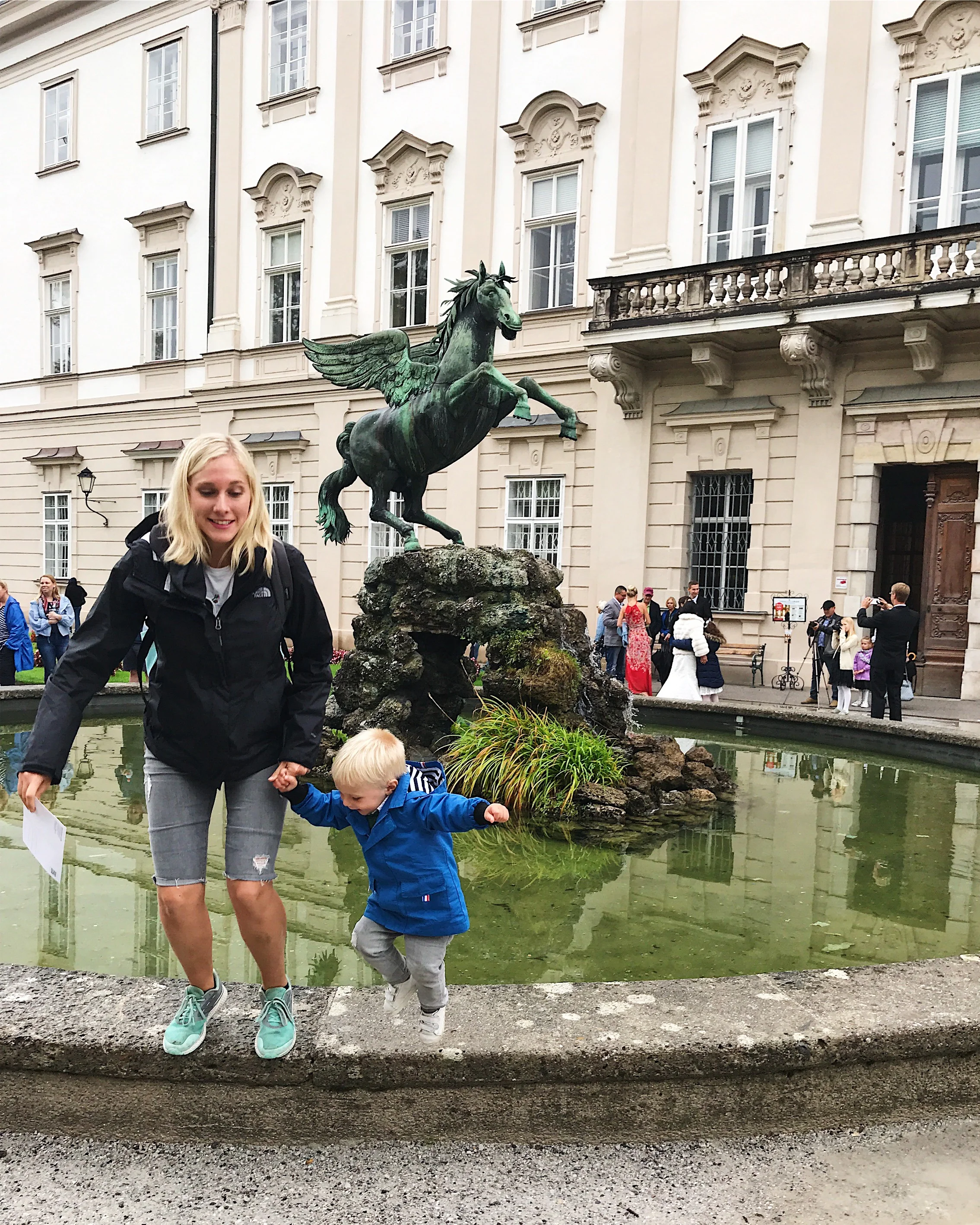 JUMPING OFF LEDGES AT MIRABELL PALACE IN SALZBURG.
