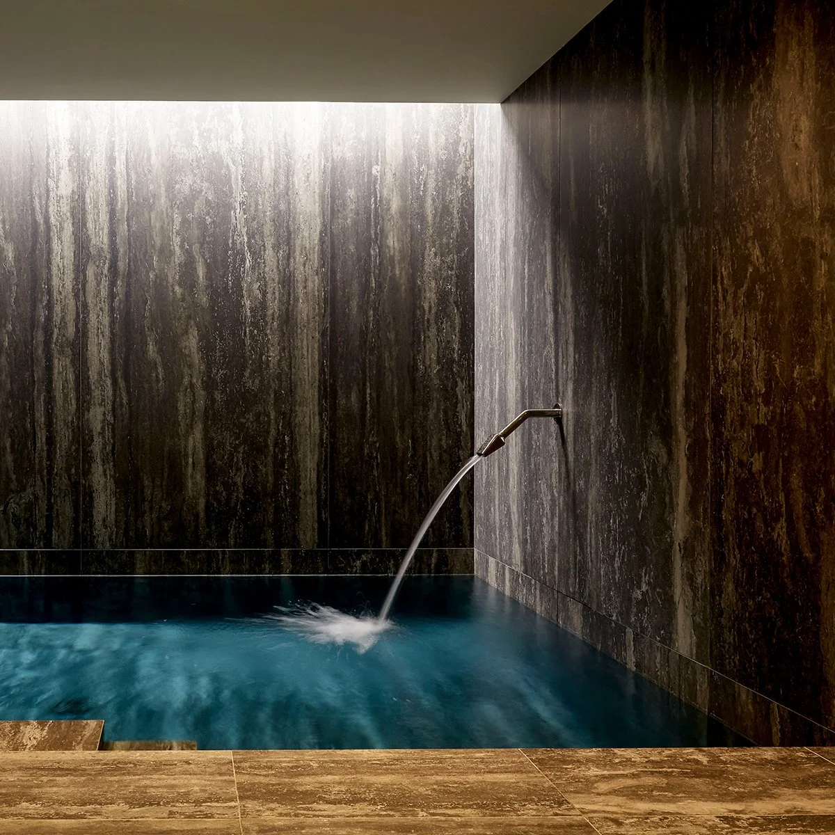 Basement swimming pool and spa with sauna and steam room in Chelsea residence