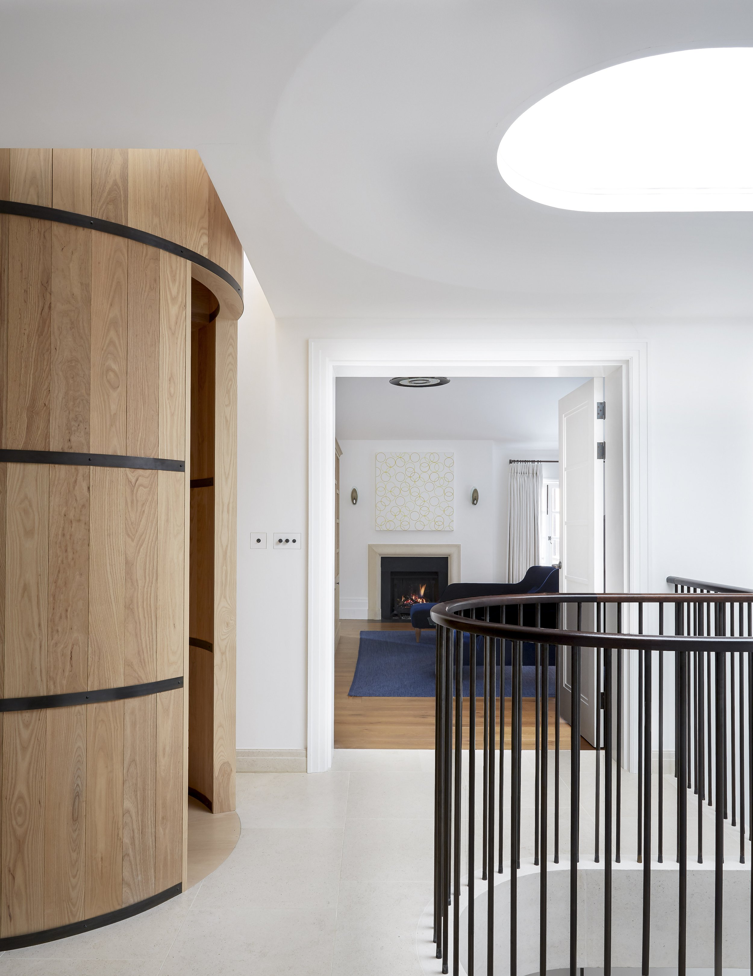 Interior detail with bespoke timber and marble finishes in Chelsea home