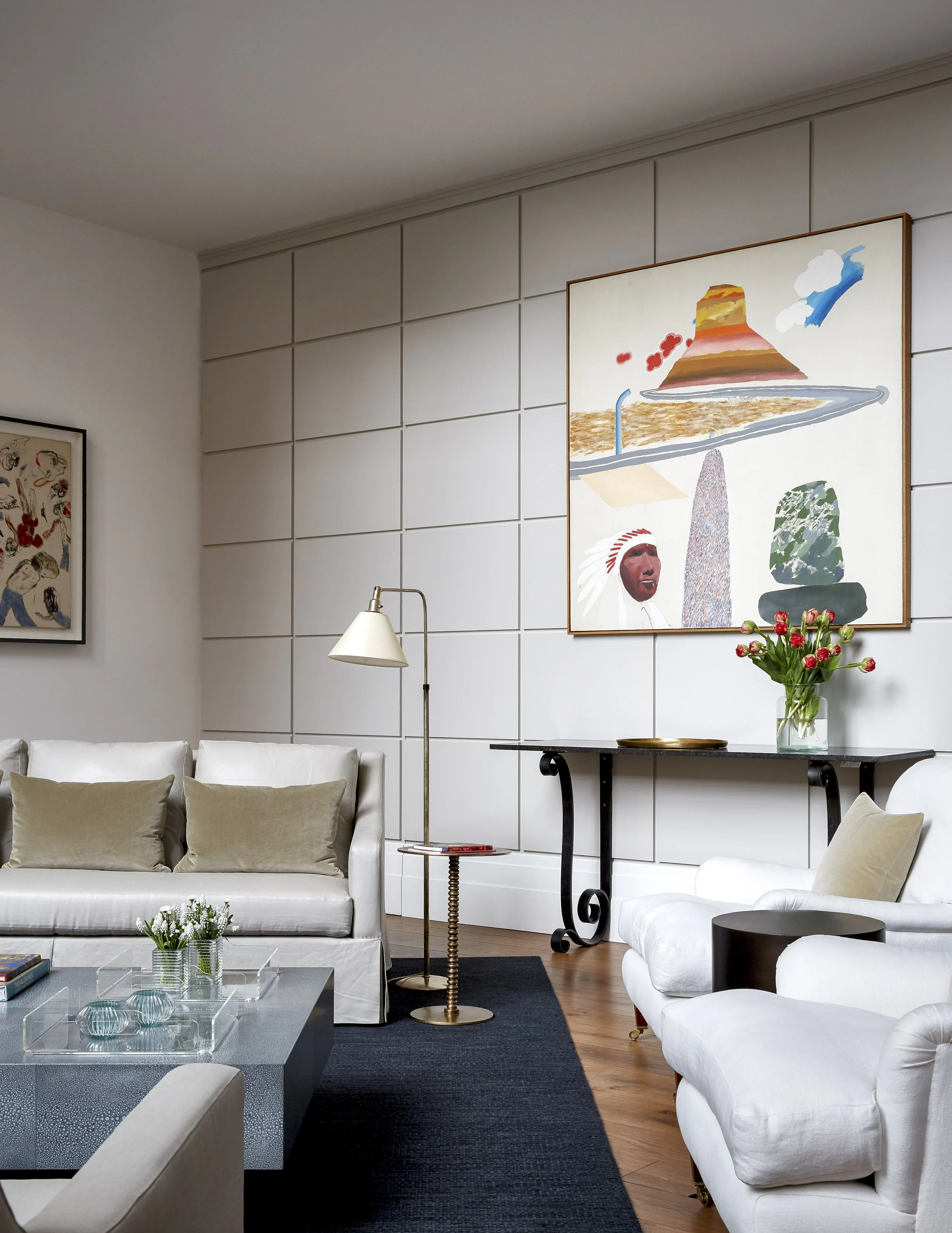 Double-height living room with mezzanine library in Chelsea townhouse renovation