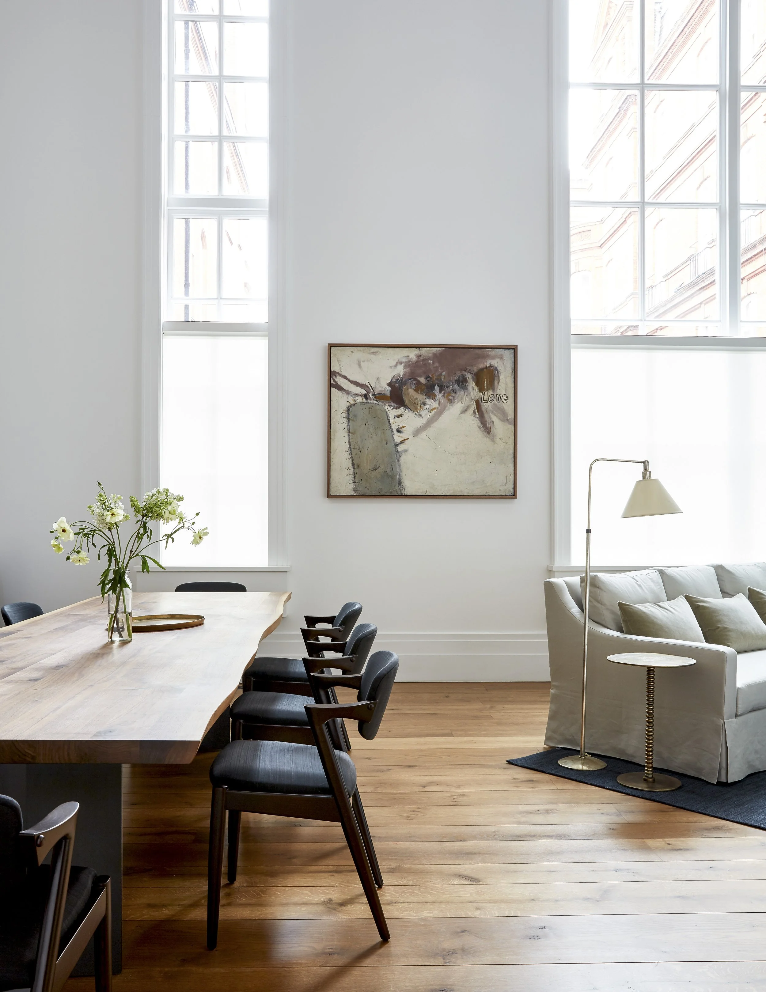 Open-plan reception room with mezzanine level in contemporary London refurb and renovation