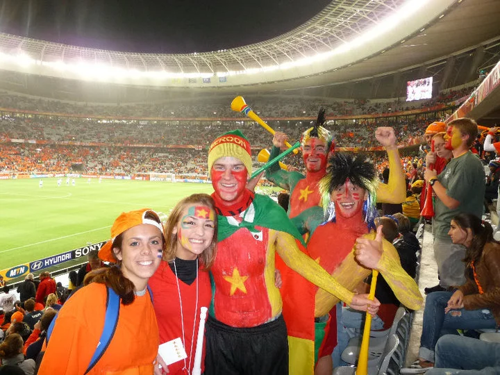 The painted buffoon in the middle wearing a beanie... that's me. 