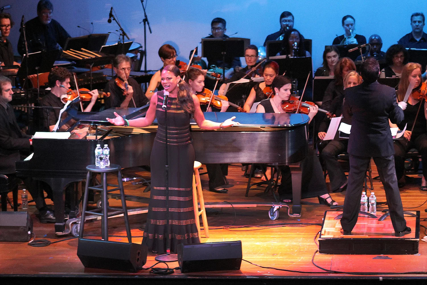 audra isngs w orch hands out lo res.jpg