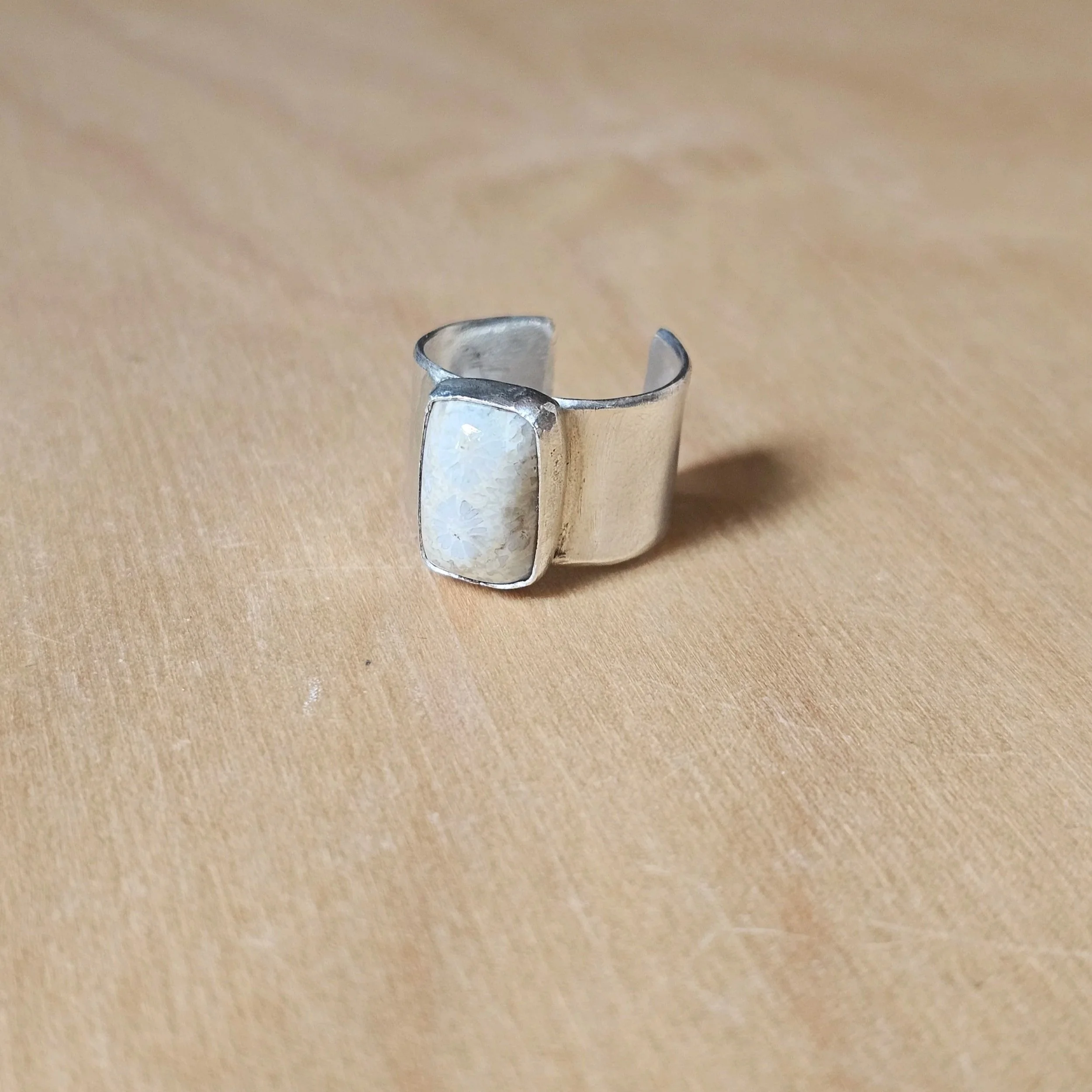 Sterling silver and fossilised coral