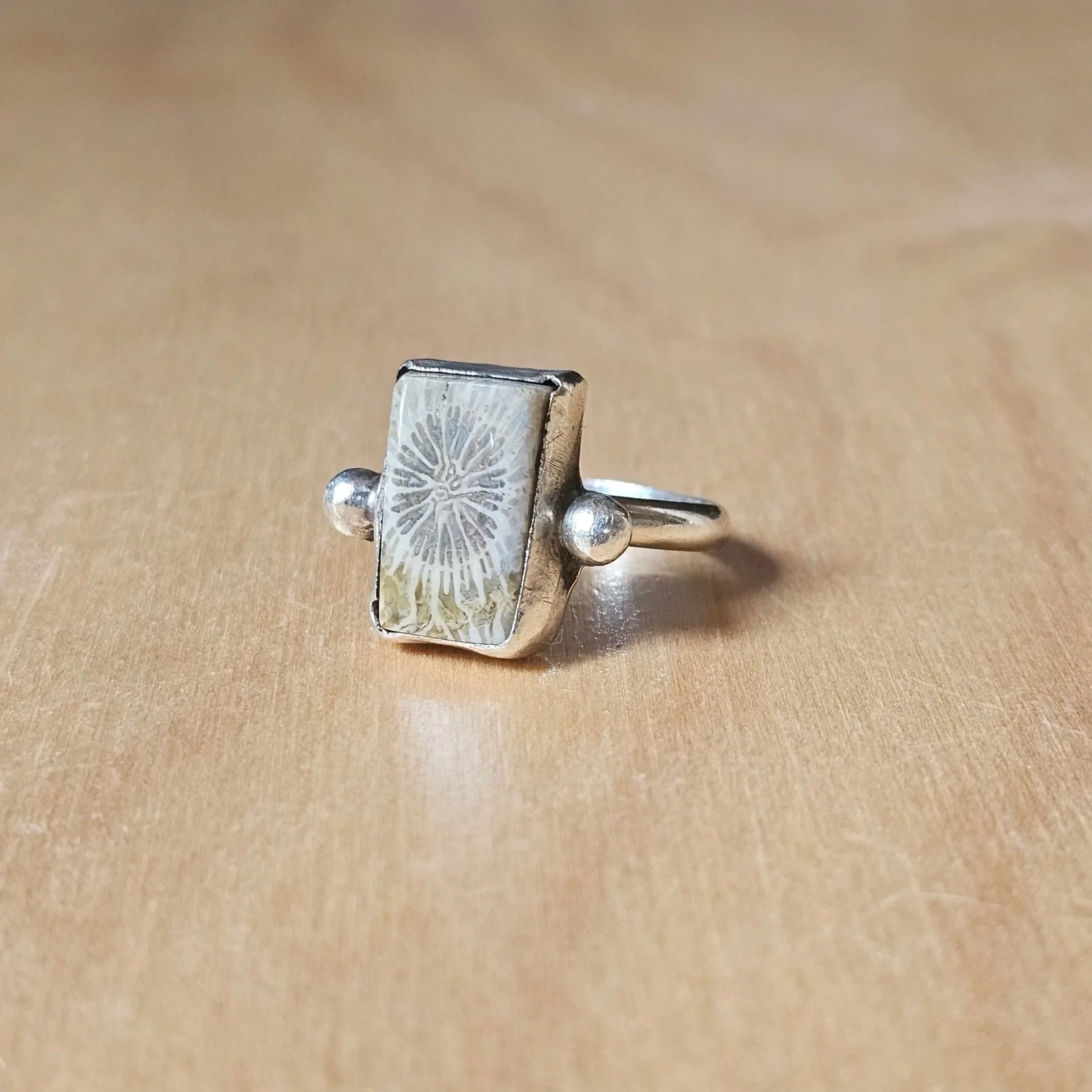 Sterling silver and fossilised coral