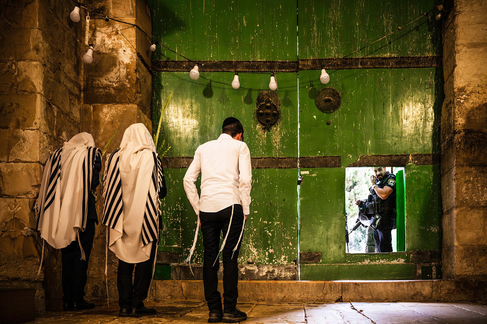 COTTON MERCHANT'S GATE (Young Jewish worshippers prevented from passing through to the Temple Mount) Pigment print on cotton rag 60 x 90cm Steve Trutwin Framed $950 Unframed $750