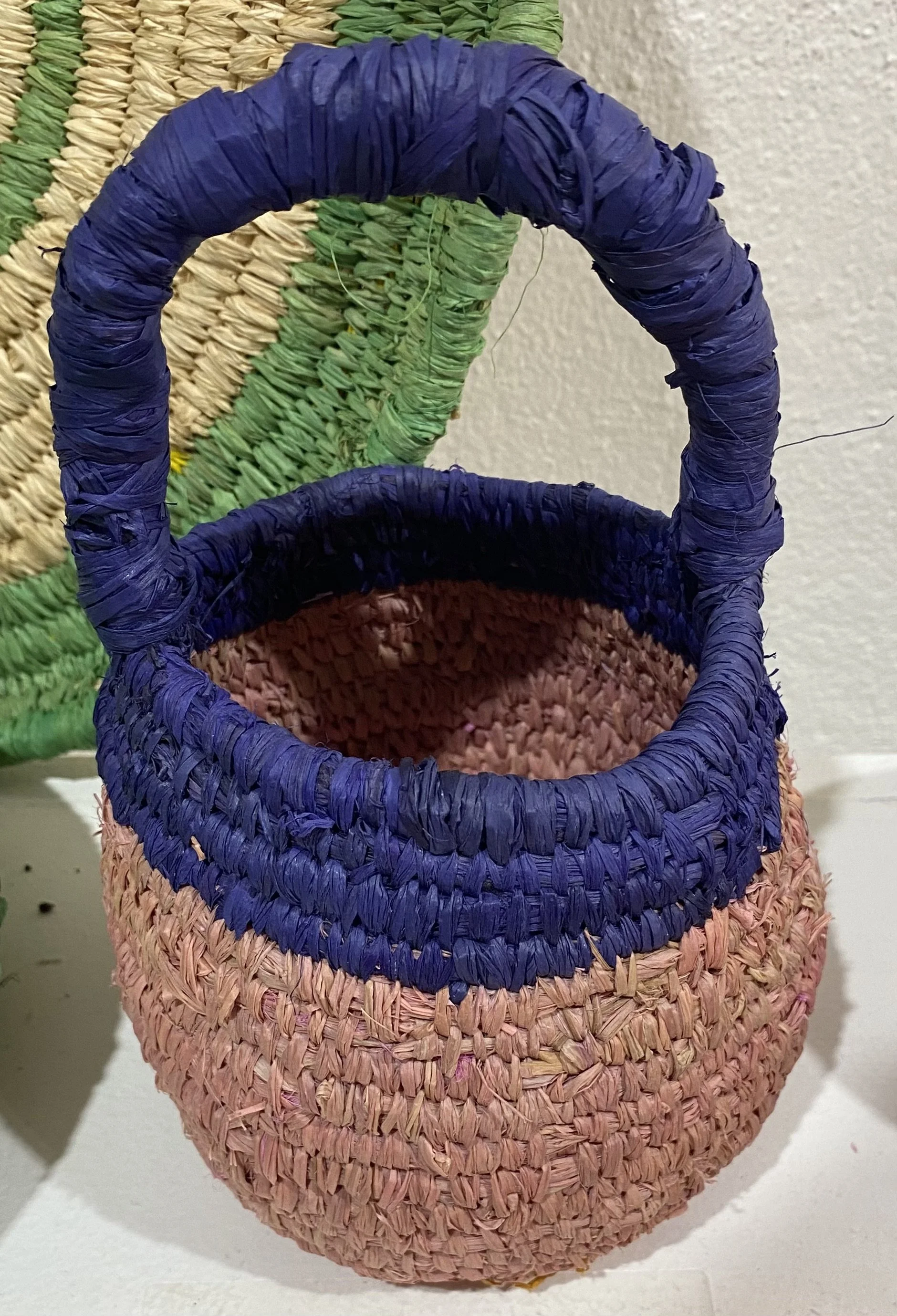  PINK AND BLUE HANDLE BASKET     Raffia    Cathryn Charnock  $44