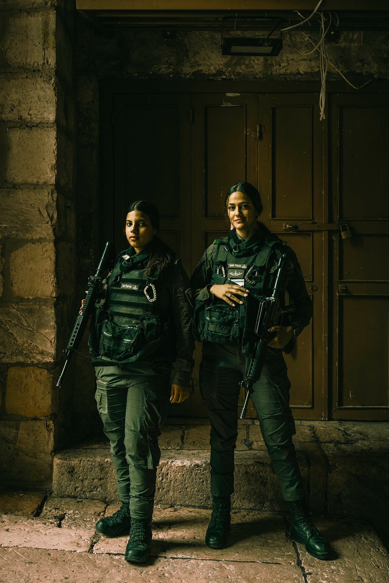 FEMME FATALES (Two soldiers guard the Cotton Merchant's Gate to the Temple Mount, Jerusalem) Pigment print on cotton rag 120 x 85cm Steve Trutwin Framed $1250 Unframed $950