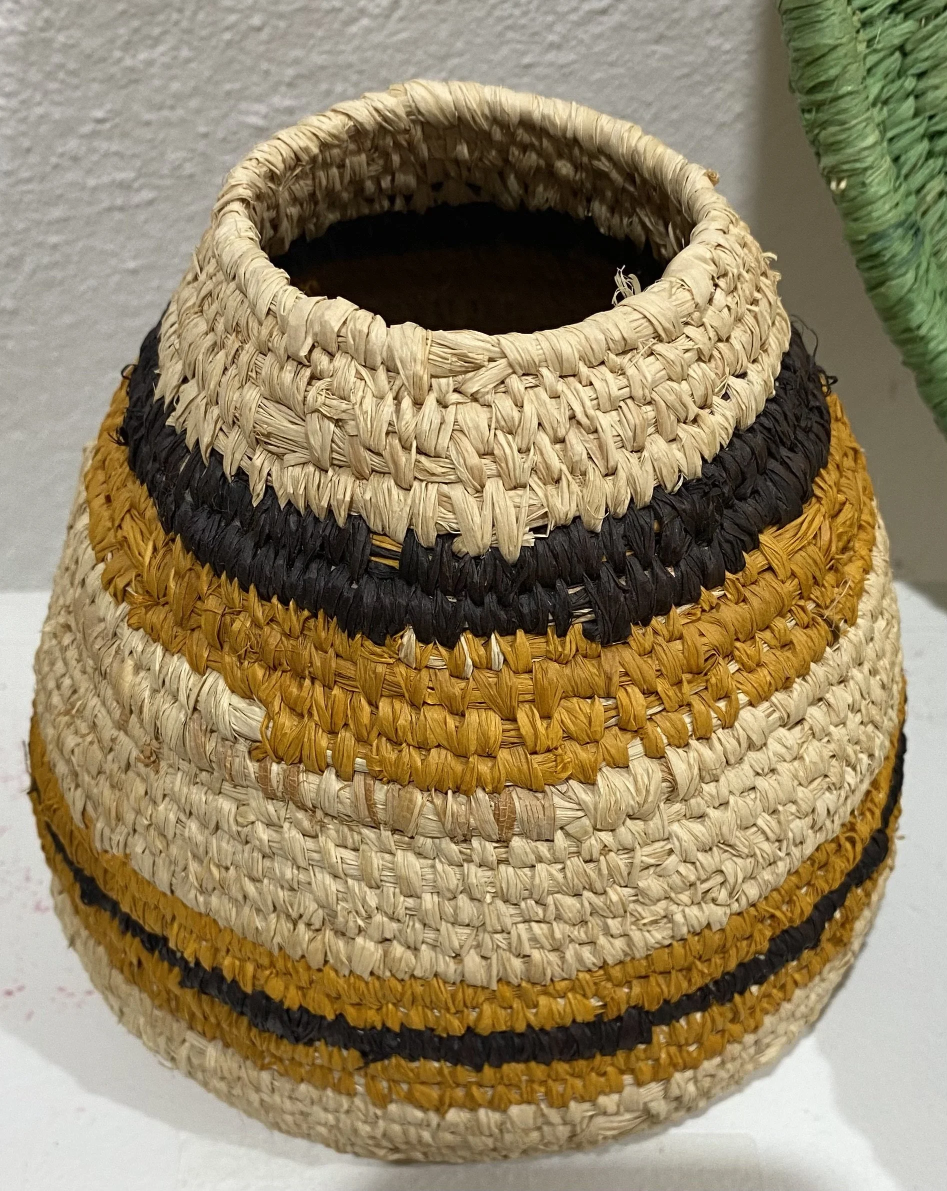  TAPERED ORANGE,BLACK AND NATURAL BASKET     Raffia    Cathryn Charnock  $100