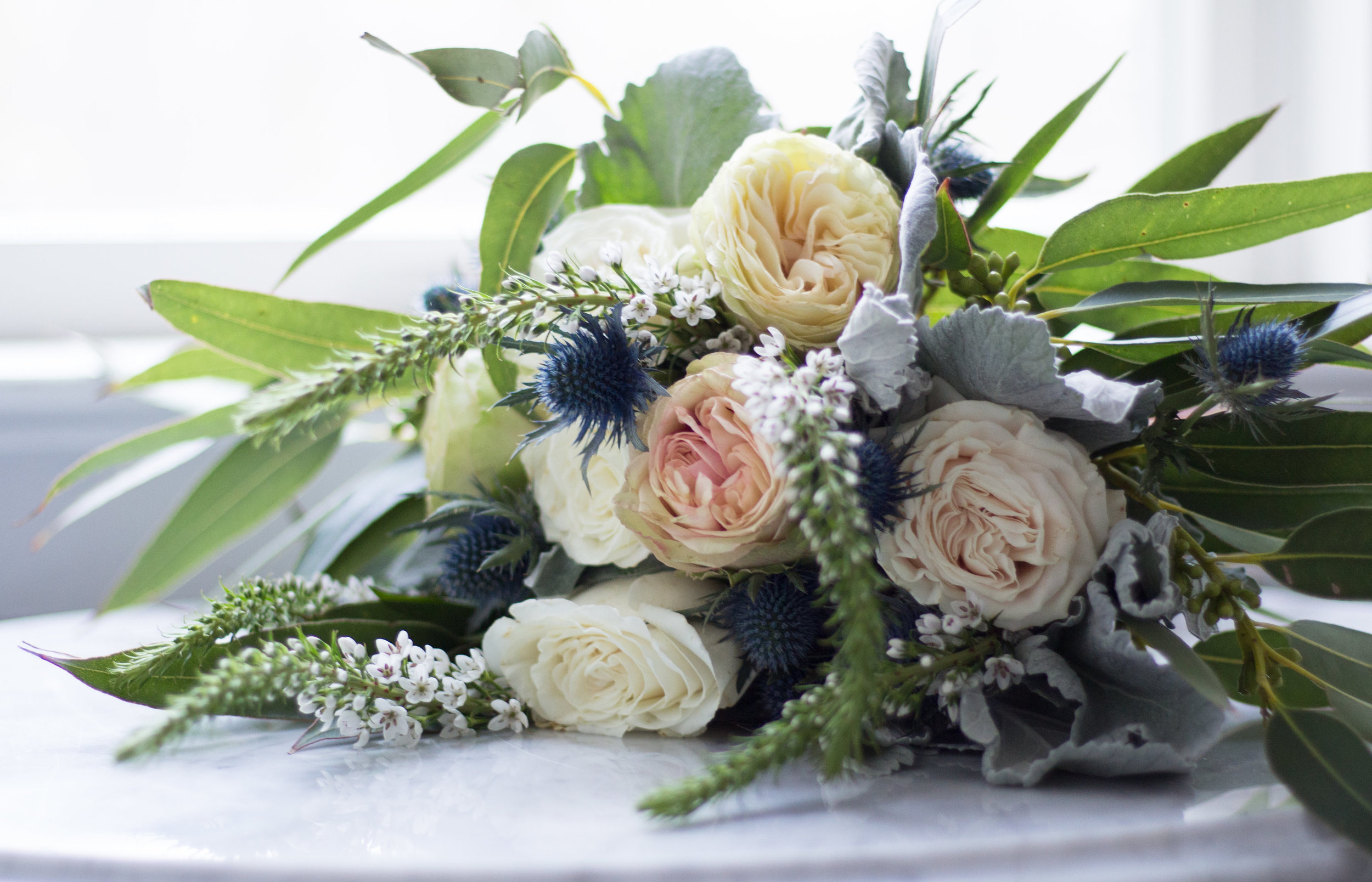 Love & Luster Floral Design Bridal Bouquet with Blush Garden Roses, Thistle and Eucalyptus