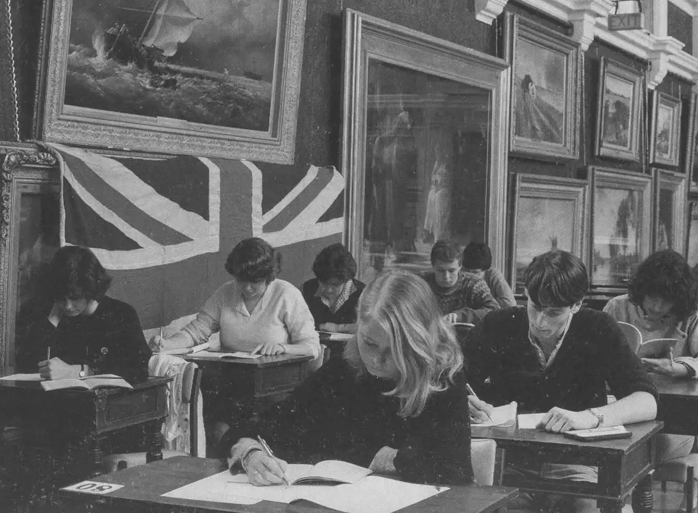 The cursed painting covered by the Union Jack flag.