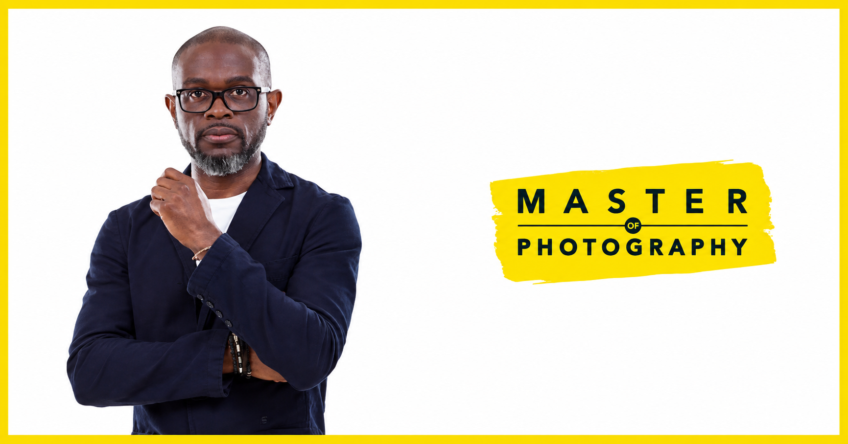 A man with glasses and a beard, dressed in a navy blazer over a white shirt, posing with his hand on his chin against a white background, next to a yellow text box that reads 'Master of Photography'.