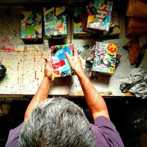 Pictured: Randal Arvilla with works from his series Self Portrait