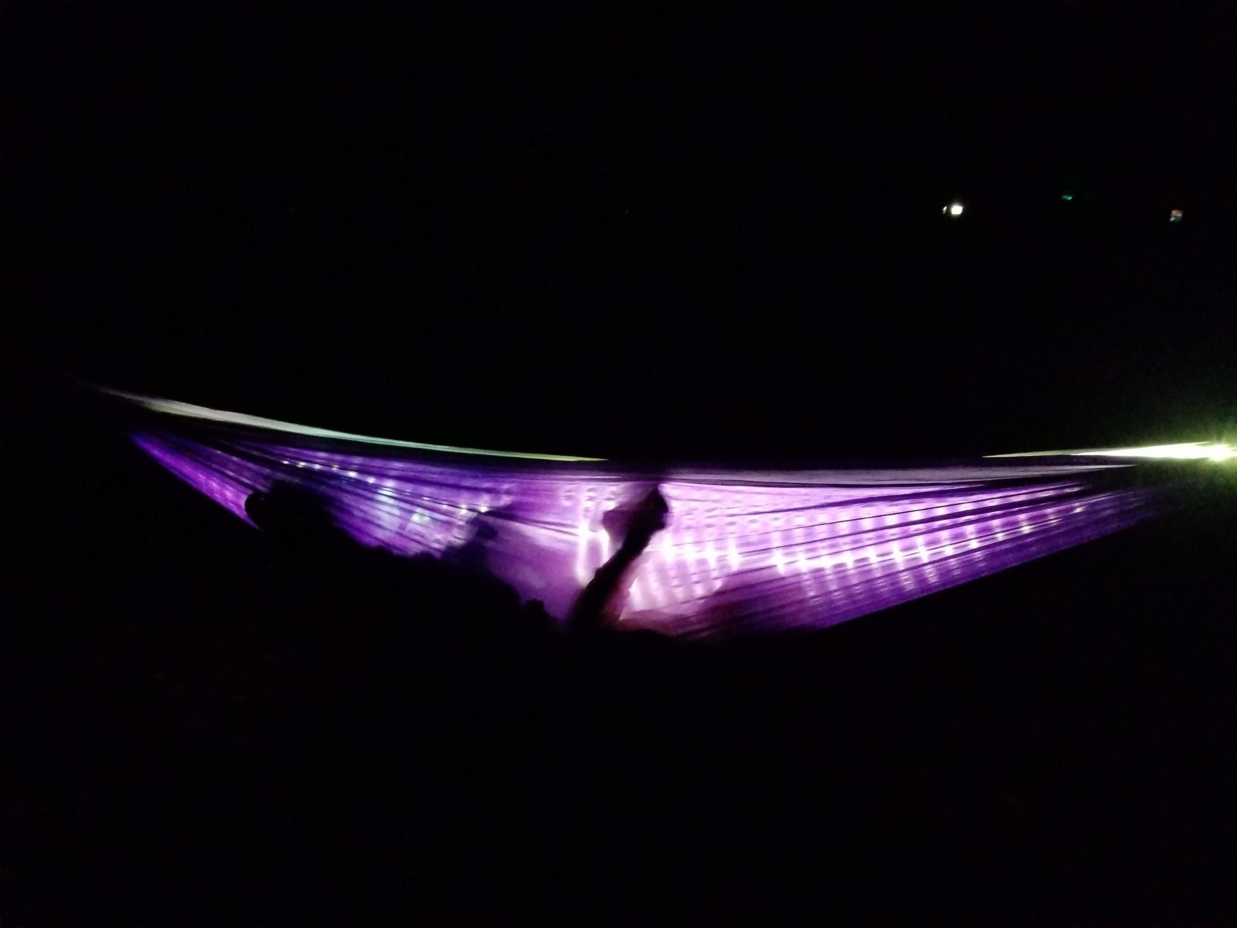 Reading in the hammock at night