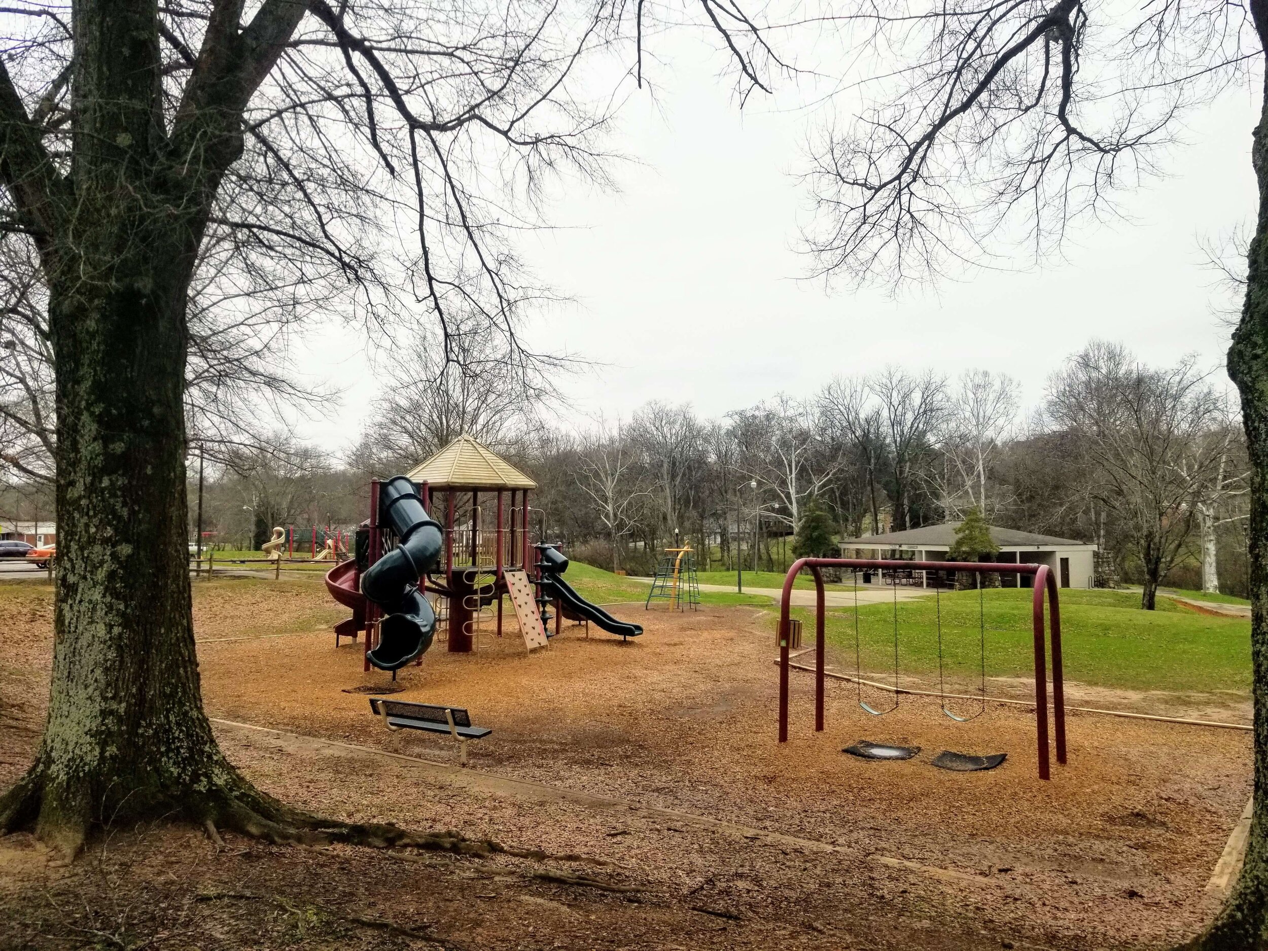 Big kid playground and covered picnic area at Sandy Springs Park