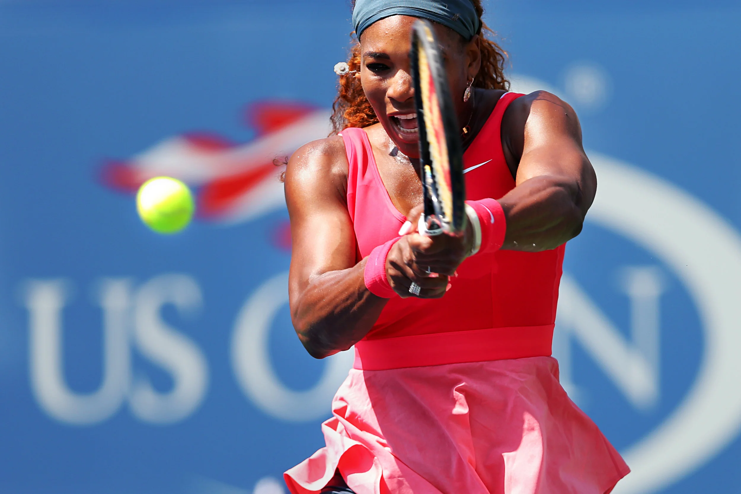 Serena Williams returns to Galina Voskoboeva during the women singles second round at the U.S. Open tennis tournament held at Arthur Ashe Stadium in Queens, Ny. Williams defeated Voskoboeva 6-3, 6-0.