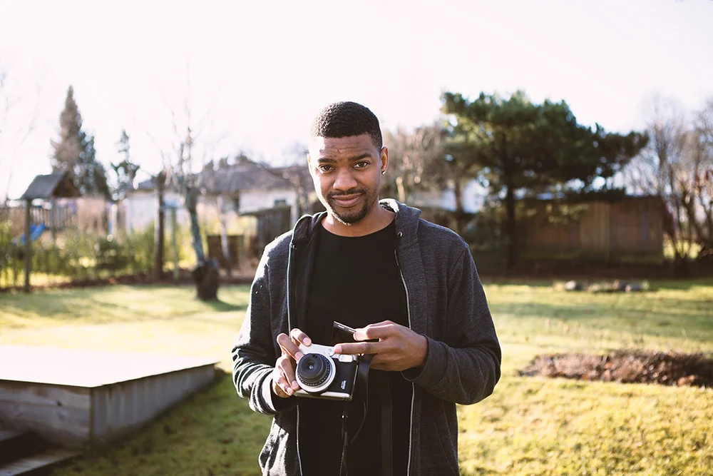 Me using a polaroid camera.