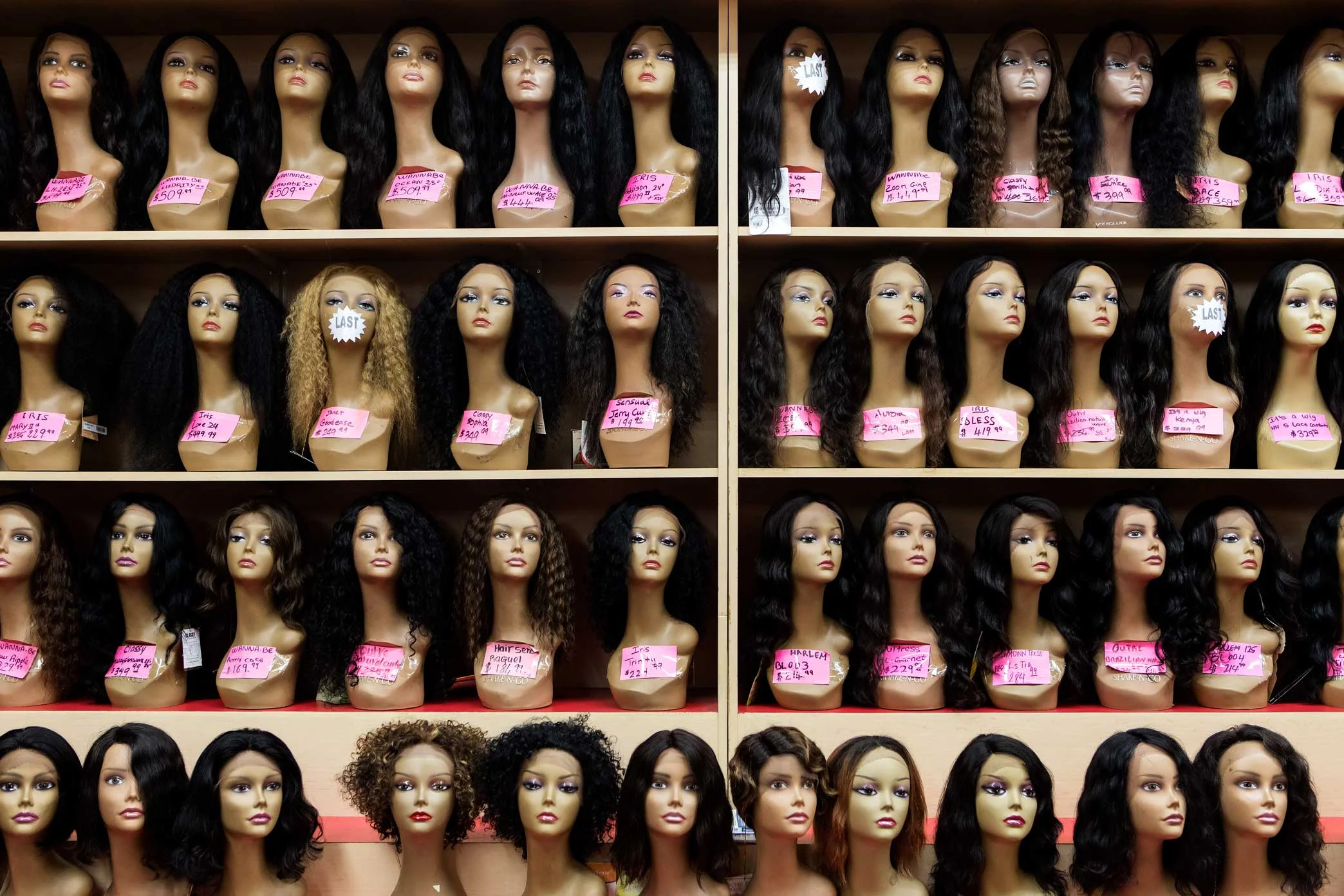 Wigs on display at Apollo Beauty Land in Harlem, Manhattan.