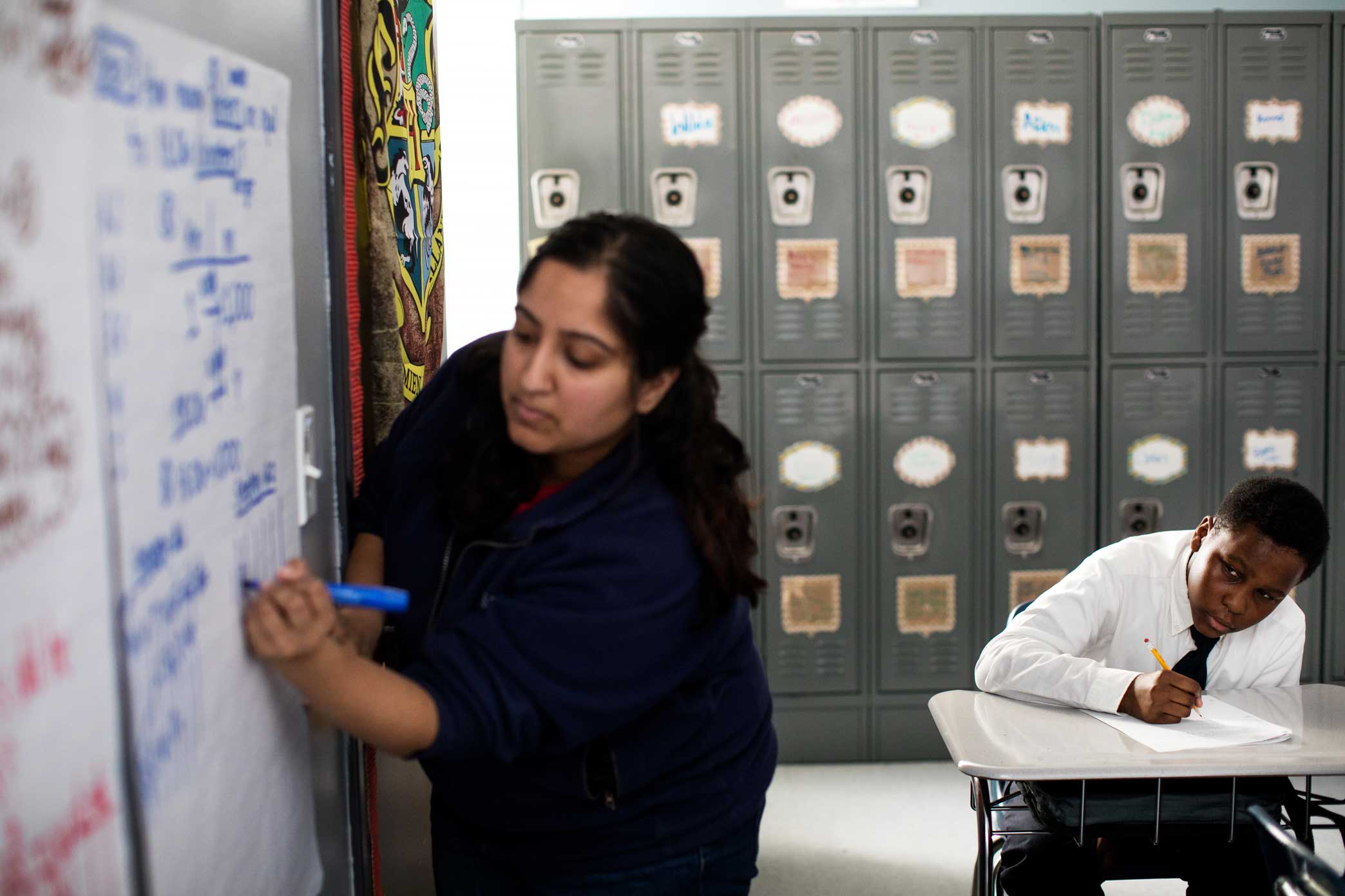  Math Teacher, Dhara Patel giving her students math lessons during class at Brooklyn Ascend Charter School in Brownsville. Ascend Charter School use new conflict-resolution practices in place of traditional discipline, such as formula suspensions and
