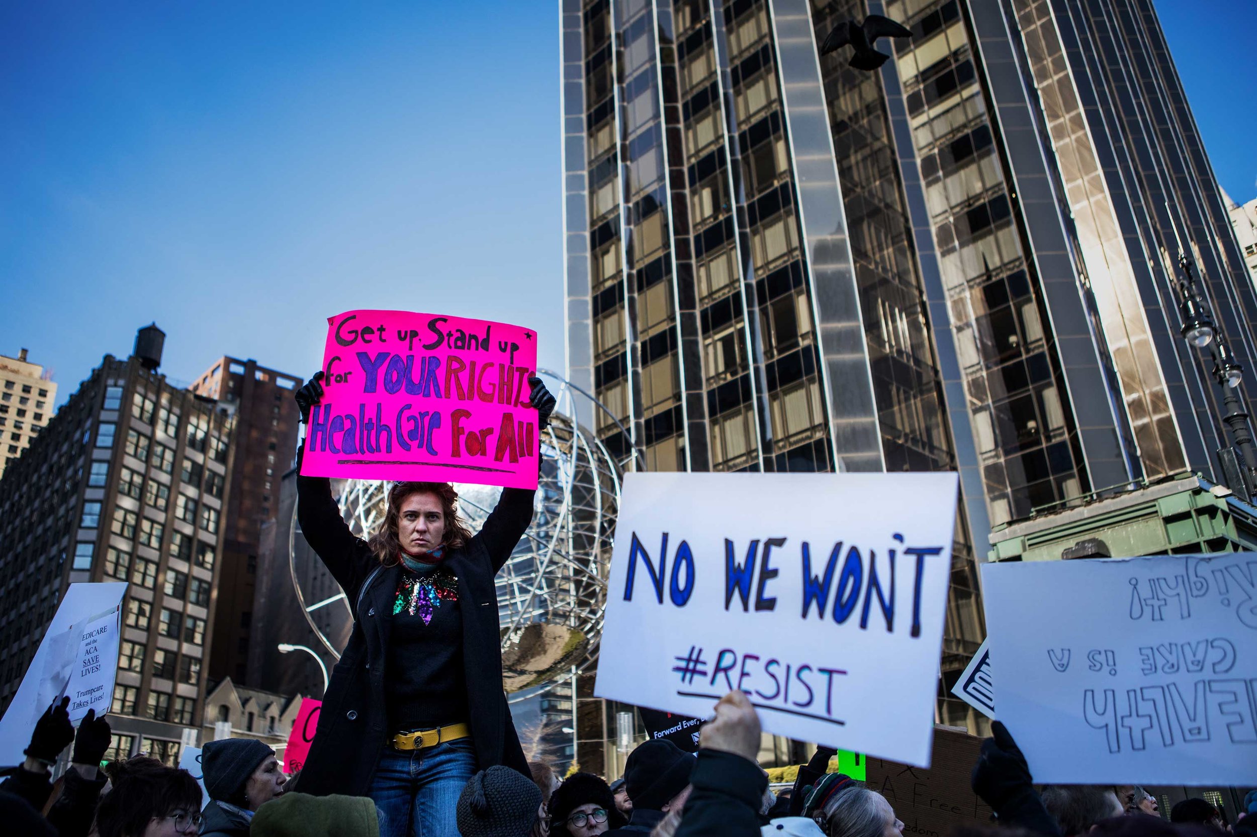 Protesters gathered on Jan. 15 in support of the Affordable Care Act outside the Trump International Hotel at Columbus Circle in new York City.
