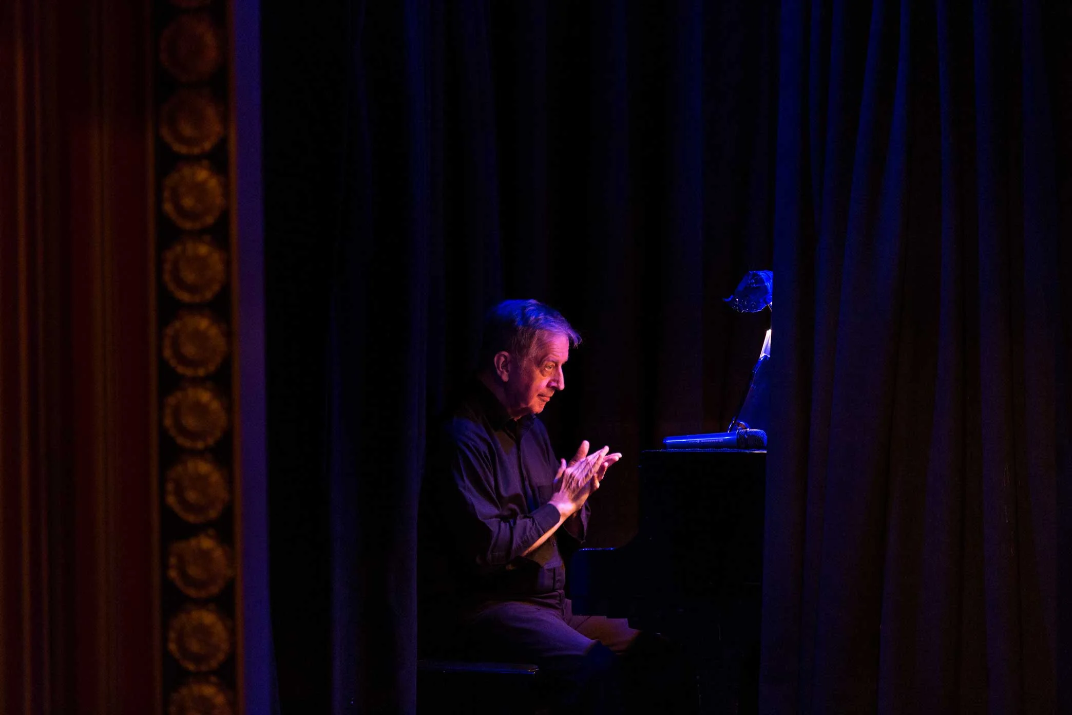 Musical Director, Fred Barton at thew piano before the start of Spamilton: An American parody and musical of the Broadway show Hamilton at The Triad in Manhattan.