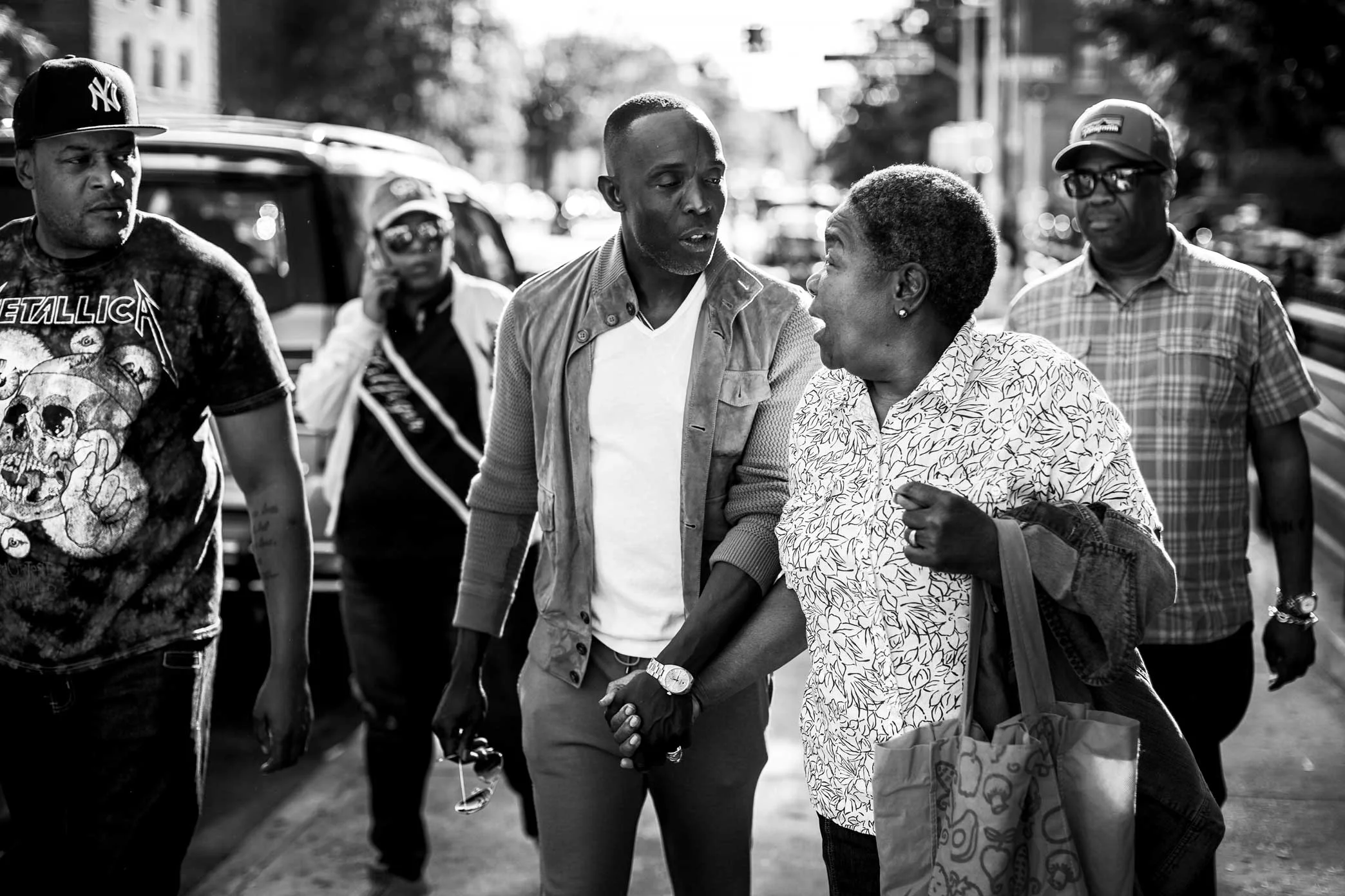 Michael K. Williams with residents of East Flatbush, Brooklyn, where he grew up.