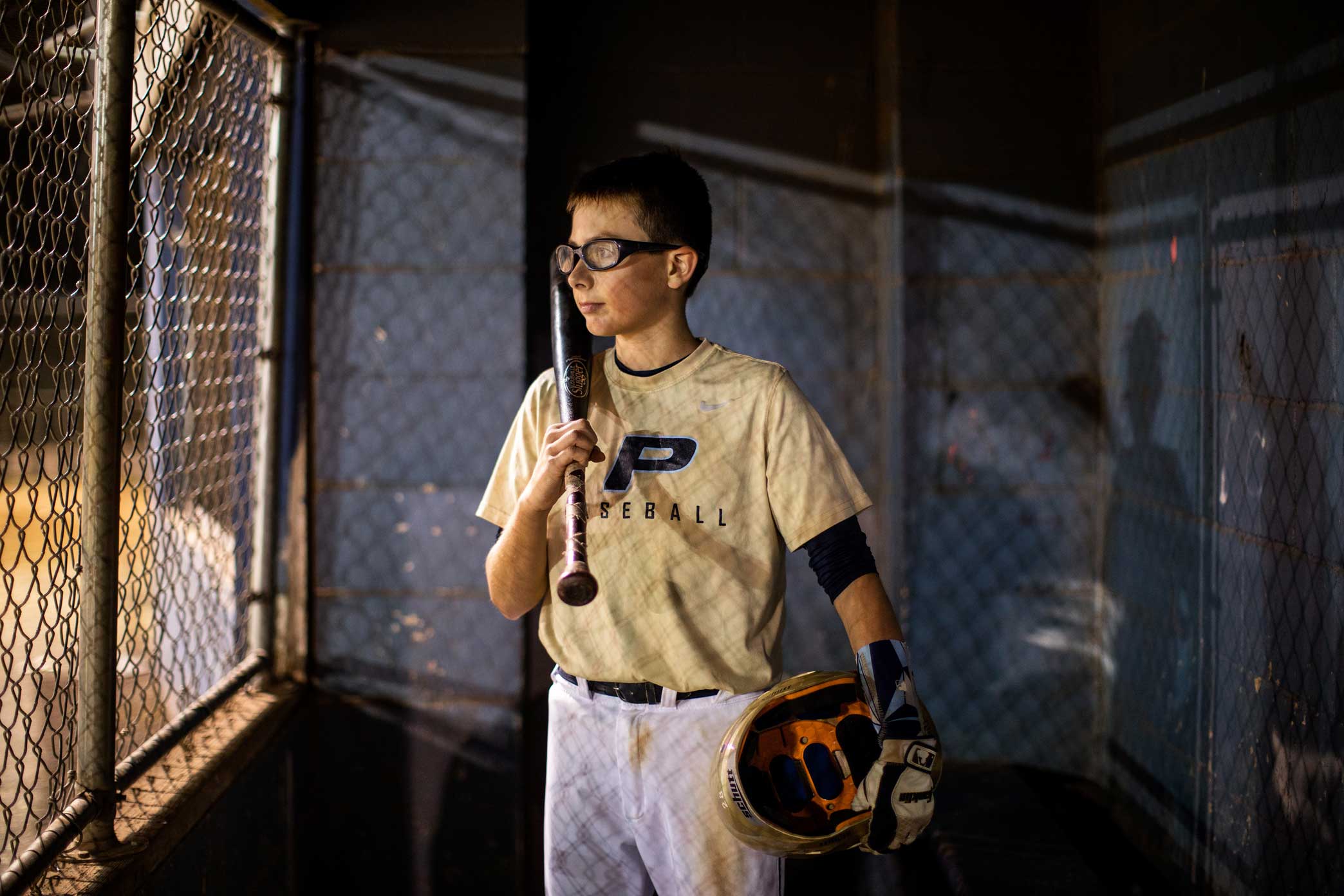 Alex Miller in the dugout at the New Springville Little League complex in Staten Island, New York.