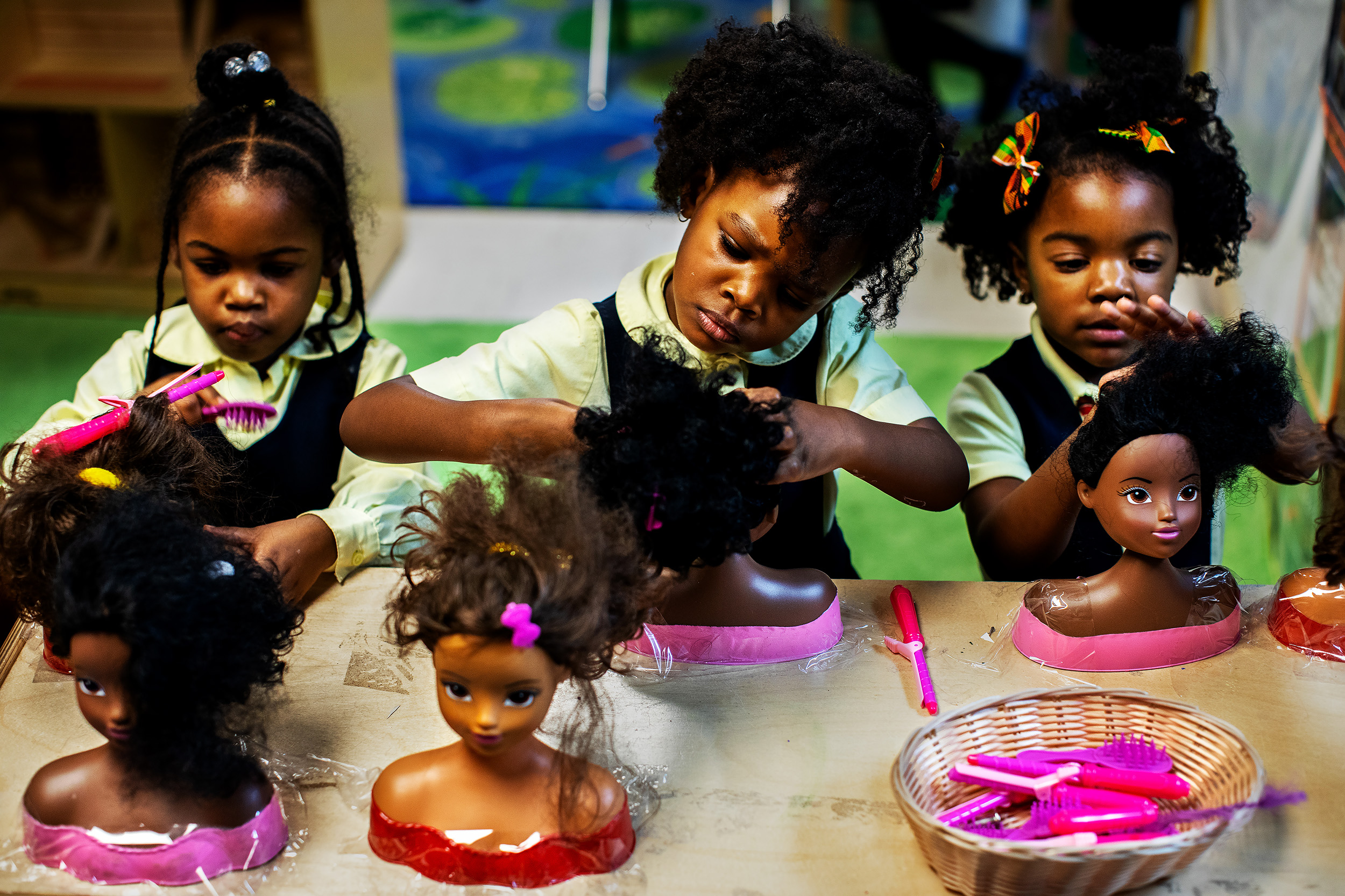  “Little Sun Girls”  Students at the Little Sun People Private Preschool do the hair of dolls during play time in Brooklyn, New York.  Though New York City has tried to desegregate its schools since the 1954 Supreme Court ruling in Brown v. Board of 