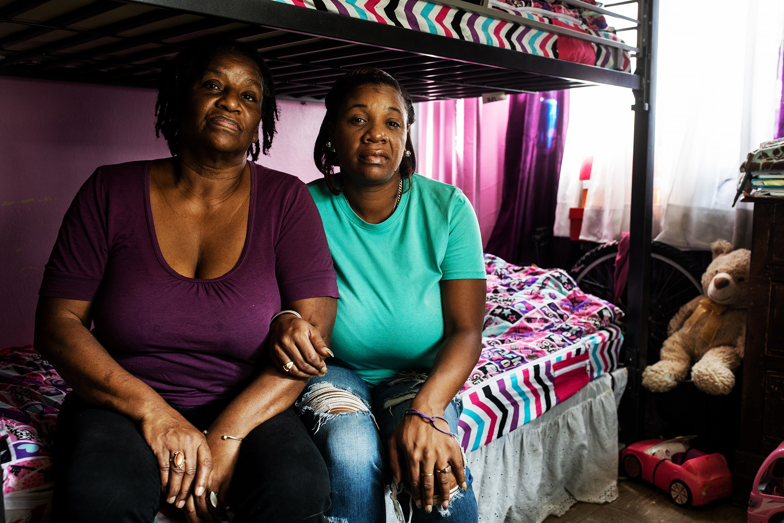  Jamila Cox, right, and Robin Parks at their apartment in Astoria Queens, New York. Jamila is a foster mother who took in a little girl and baby boy who lived next door after the children mother was killed in January 2017. 