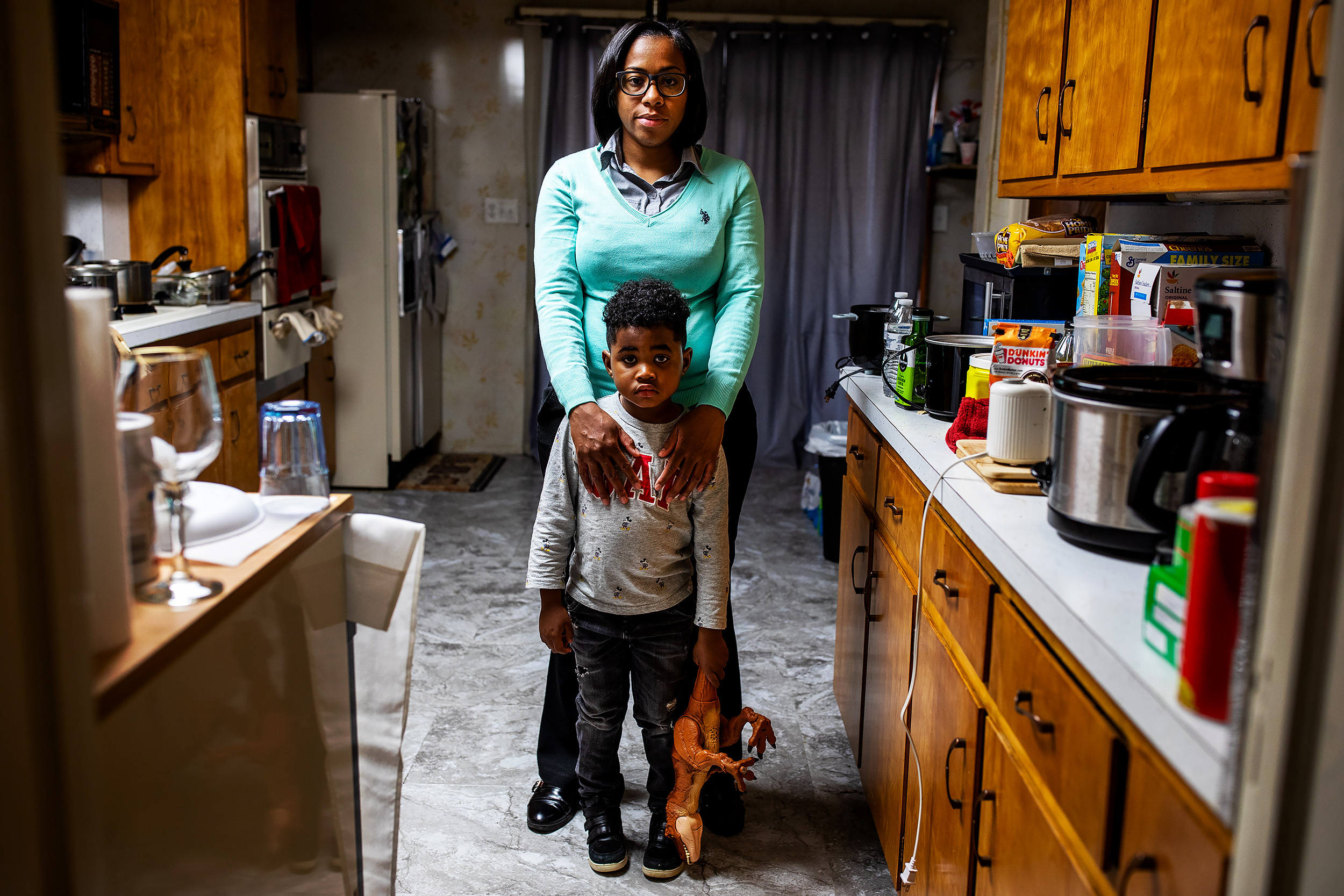  Shakima Thomas with her son Bryce at her home in Newark, New Jersey. Shakima's home water pipe was recently replaced. Newark is still in the process of fixing the corrosion control treatment process at the Pequannock plant, which is contributing to 