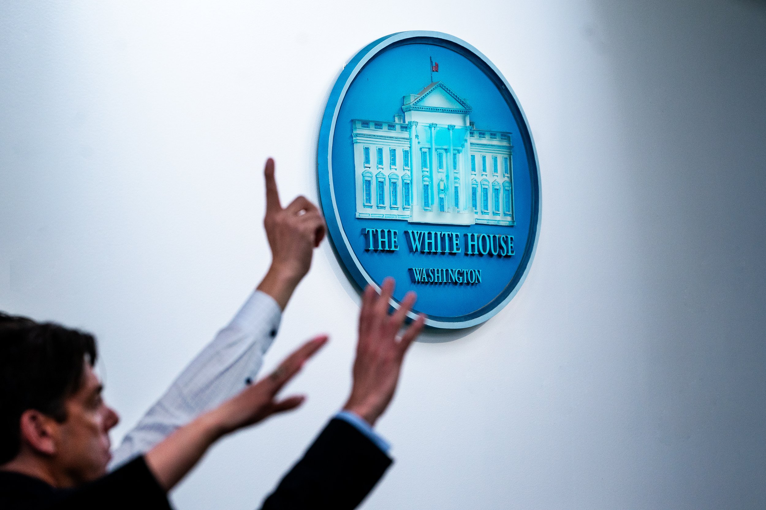  Reporters raise their hands to ask questions to National Security Advisor of the United States Jake Sullivan during the daily press briefing in the James Brady Room. 