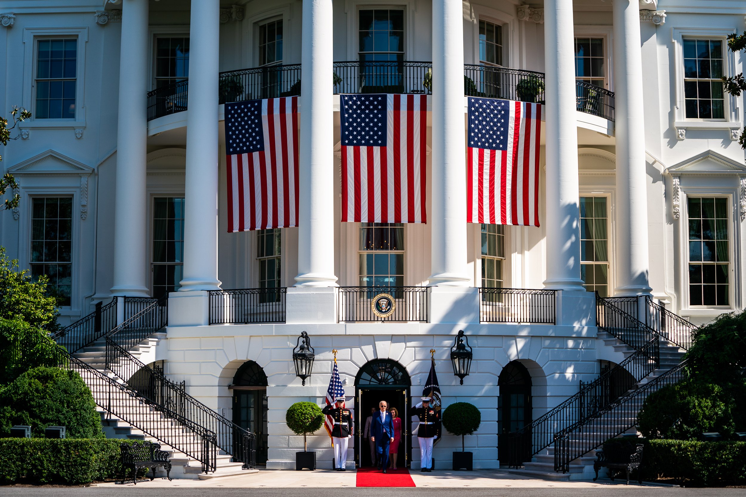  US President Joe Biden walks out to the South Lawn to sign into law H.R. 4346, the CHIPS and Science Act of 2022, on the South Lawn of the White House. 