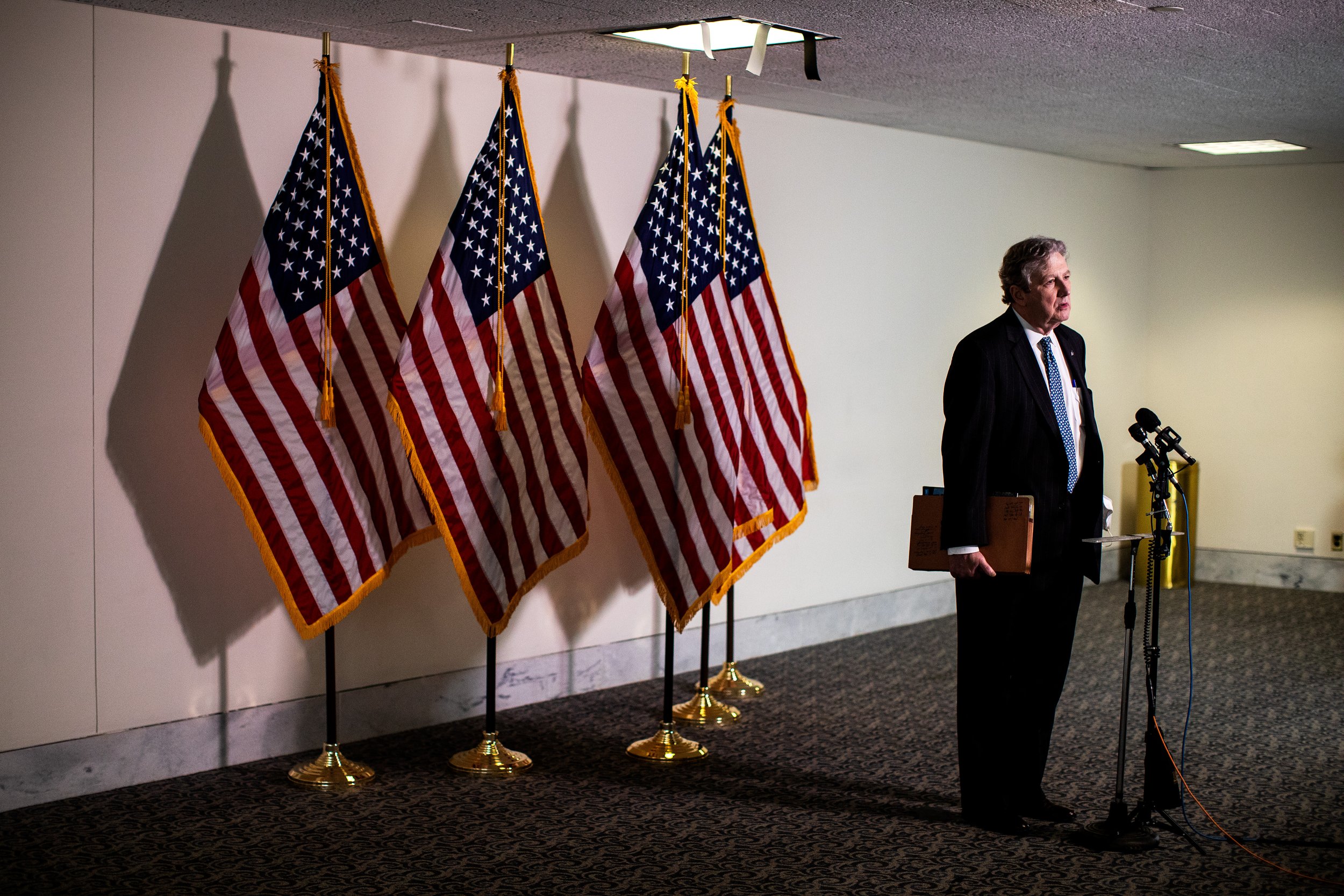  United States Senator John Neely Kennedy speaks to reporters as he makes his way to the Senate Republican Luncheon. 