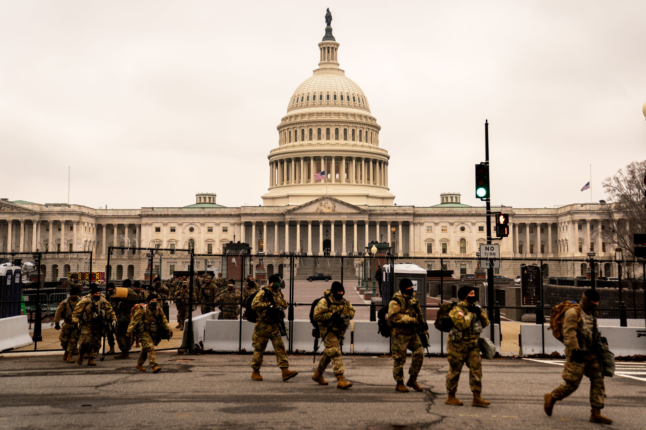  National Guard Soldiers exit the capitol grounds during the third day of the Senate Impeachment trials. 