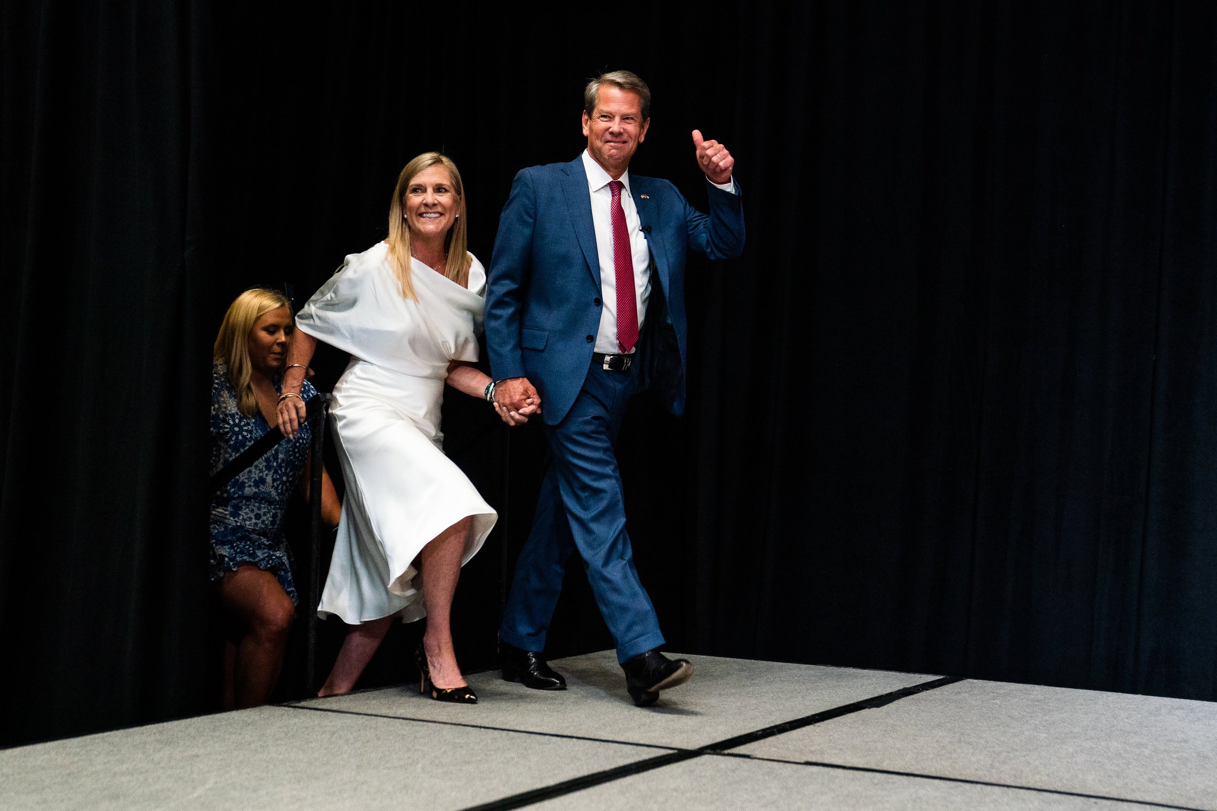  Georgia Governor Brian Kemp and his wife Marty Kemp take the stage during his Election Night Victory Party at the Chick-fil-A College Football Hall of Fame in Atlanta. 