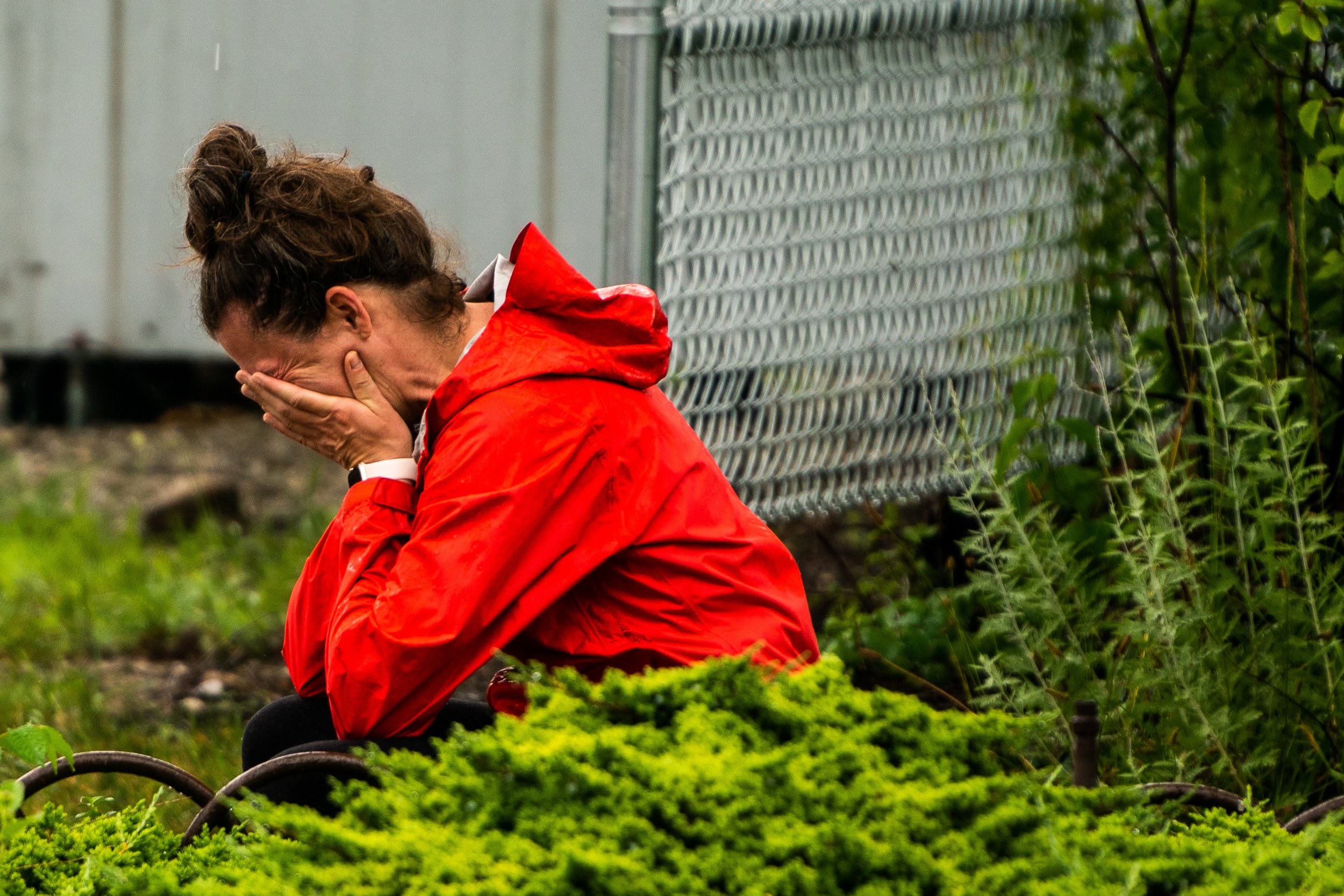  Krissa Skogen, 44, cries while visiting the crime scene of the Highland Park July 4th shooting in Highland Park. “I was across the street with family and walk through where there we bodies, they were already gone,” said Krissa. 