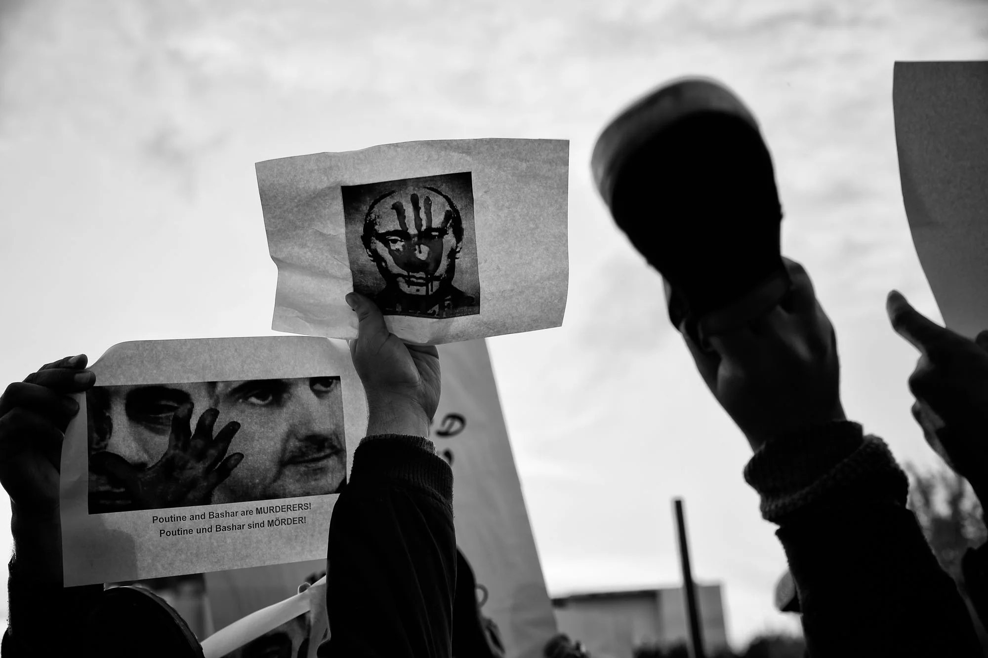 Syrer und Ukrainer protestieren in Berlin gegen den Besuch Putin