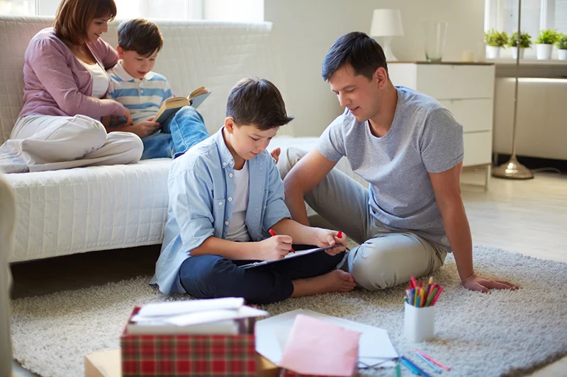 Family enjoying comfort from Ground Source Heat Pump
