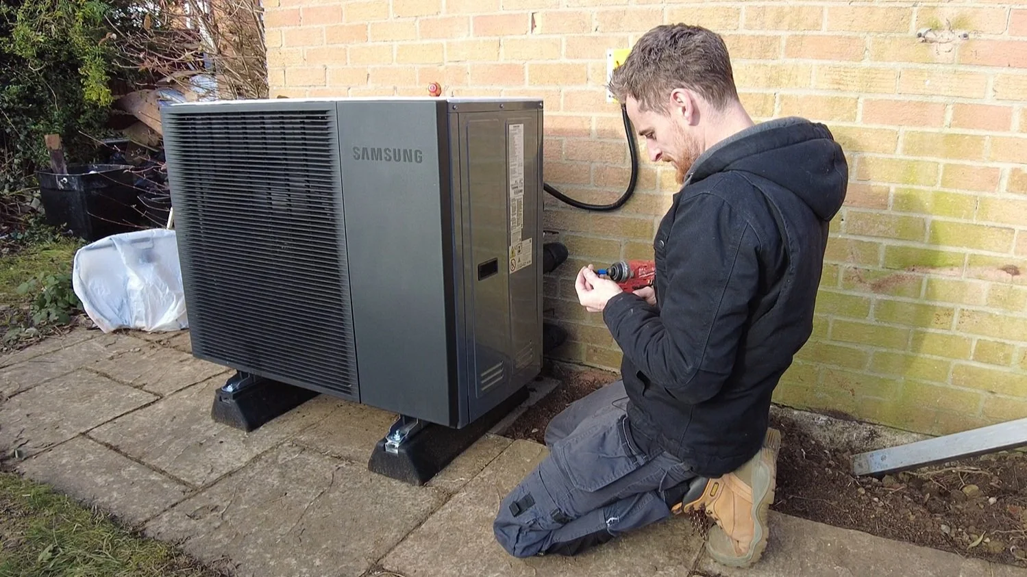 Alto Energy engineer undertaking a Samsung heat pump service