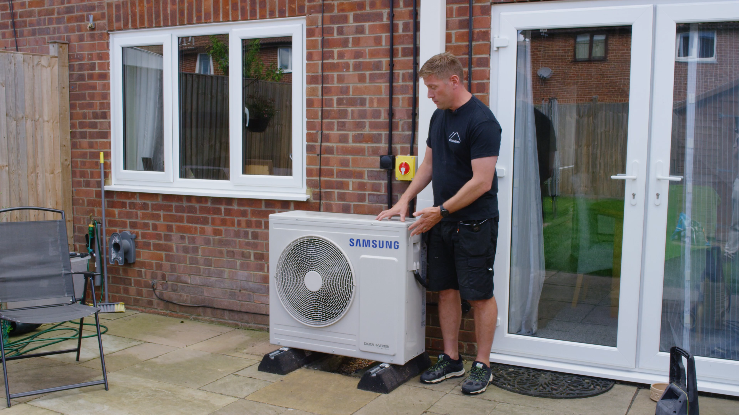 Alto Energy engineer commissioning a Samsung heat pump