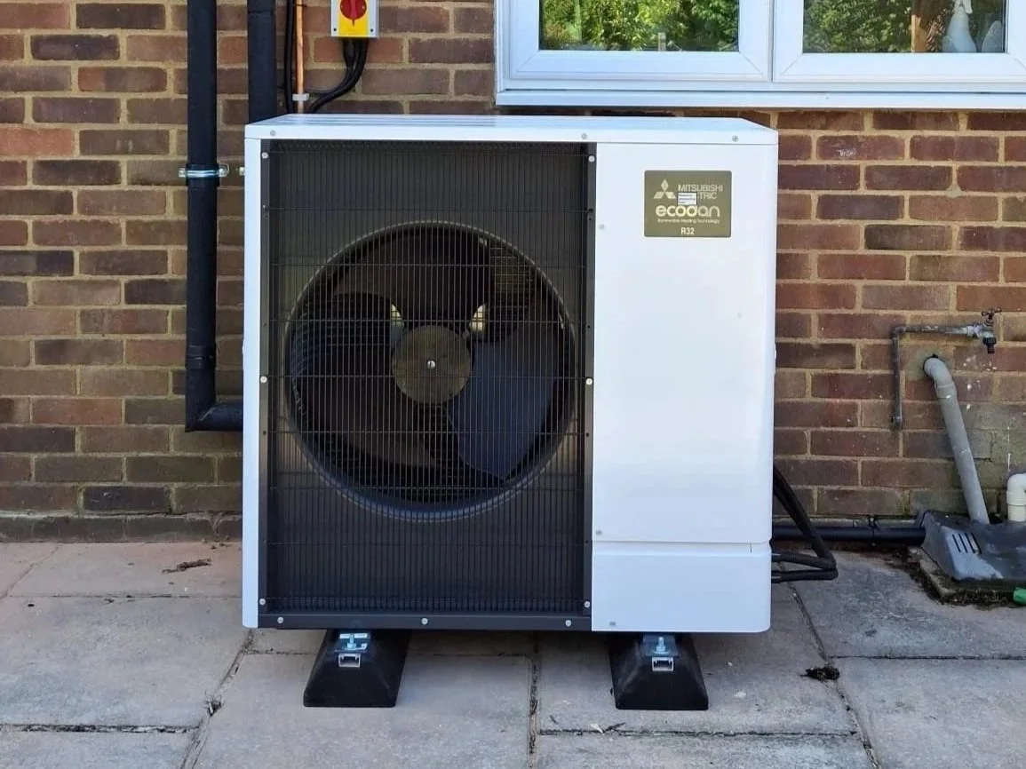Mitsubishi air source heat pump installed in an older home to improve comfort and efficiency
