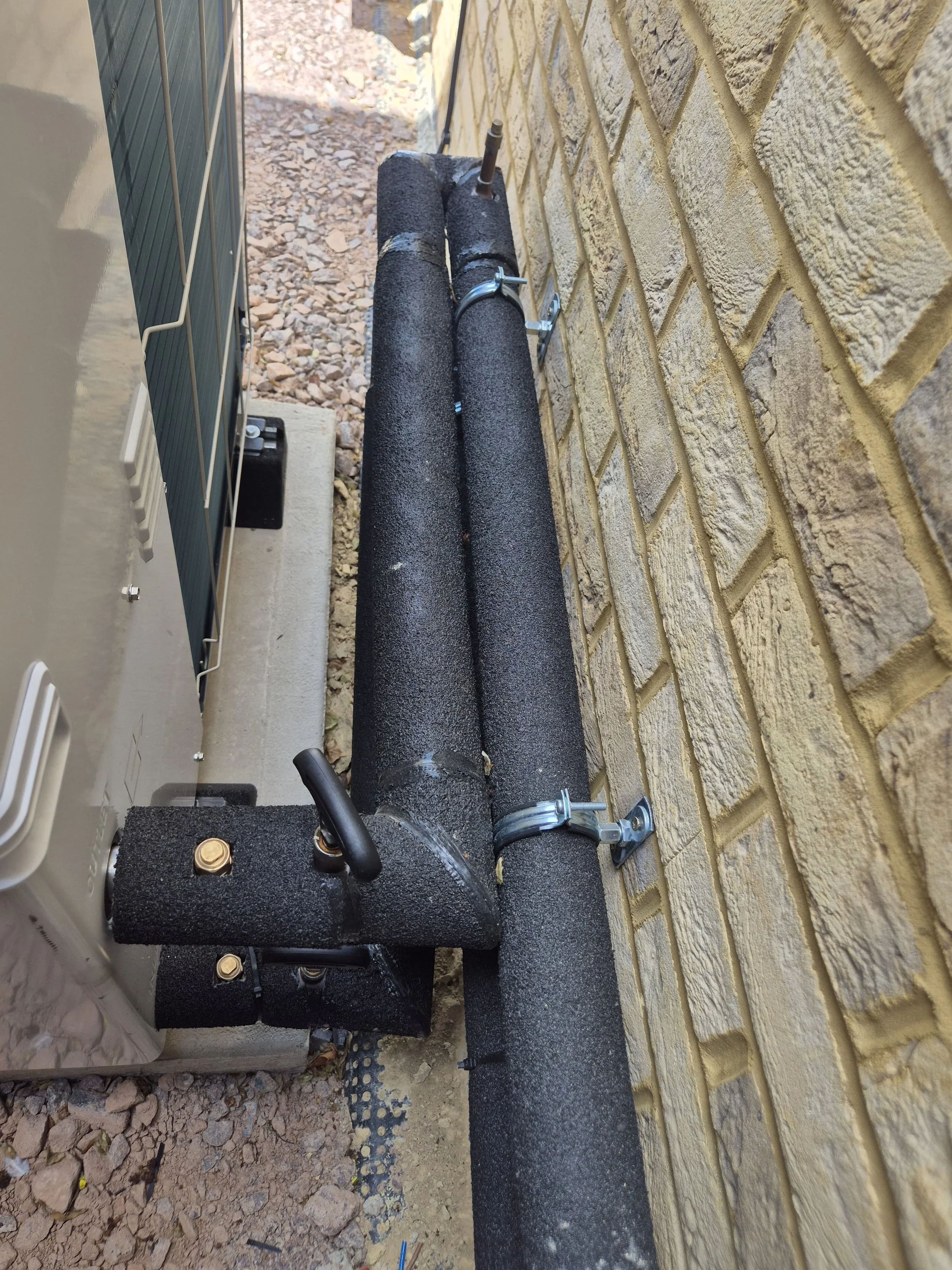 Inta anti-freeze valves installed on a Mitsubishi heat pump installation