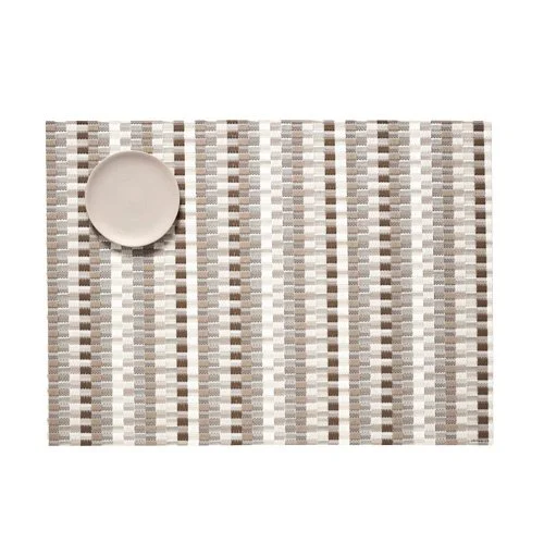 Stylish Chilewich Heddle Placemat, a sustainable woven accessory for indoor or outdoor dining spaces.