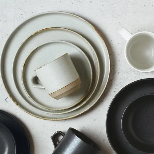 Modern ceramic mug with generous capacity and smooth handle, crafted by Kinto.